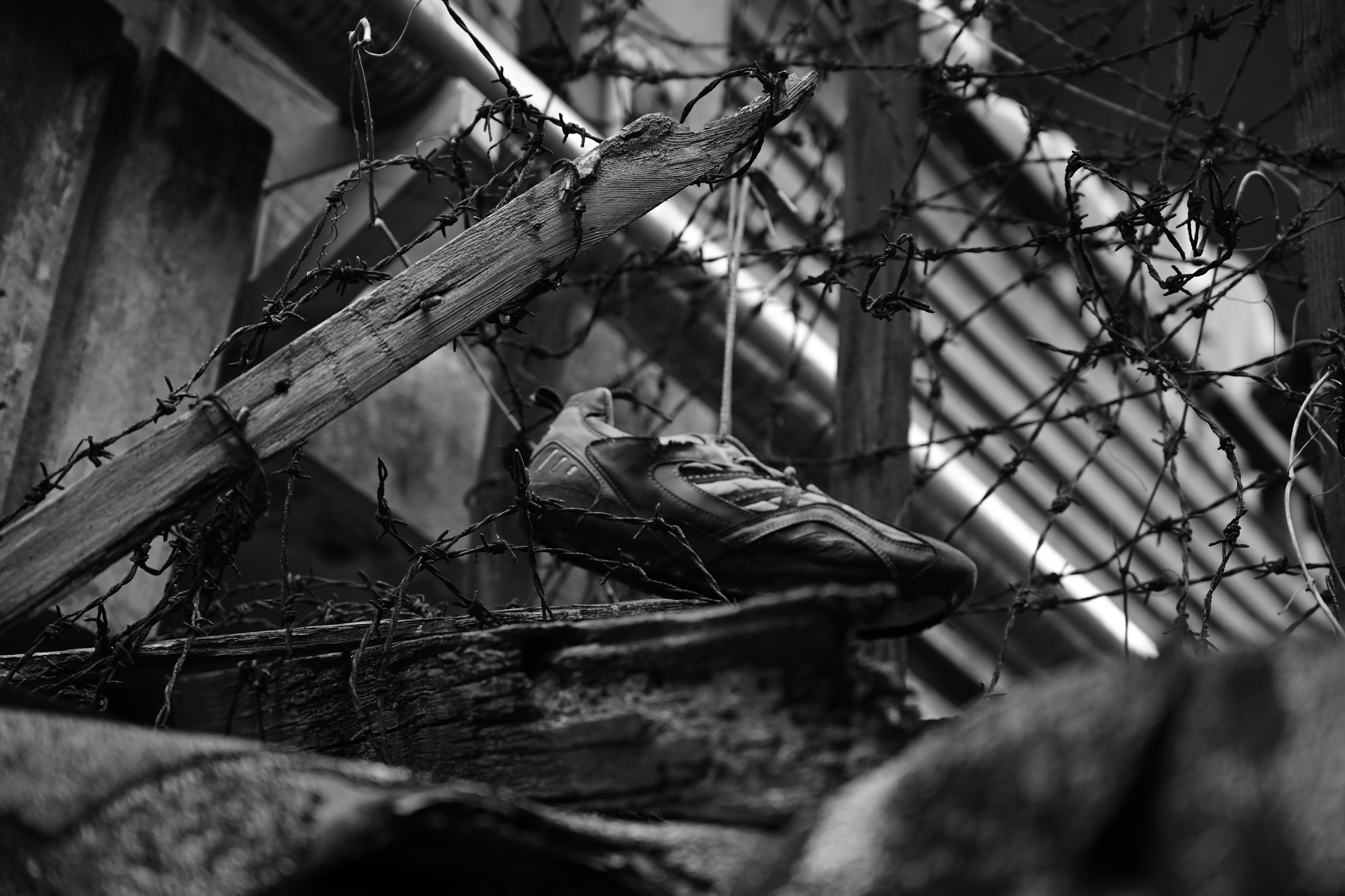 Scene of wooden debris and barricades in an abandoned setting