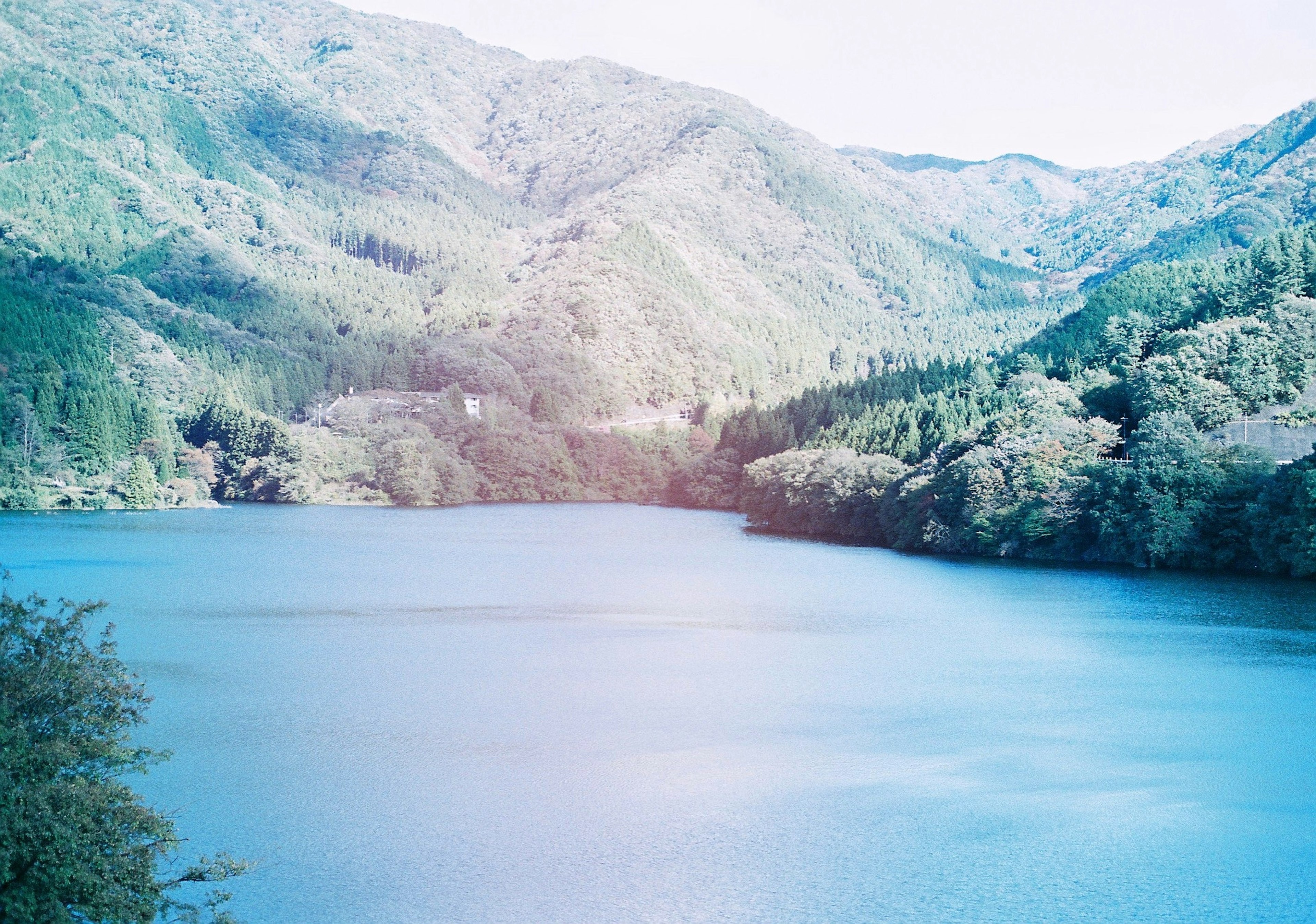 Beautiful landscape of a blue lake surrounded by mountains