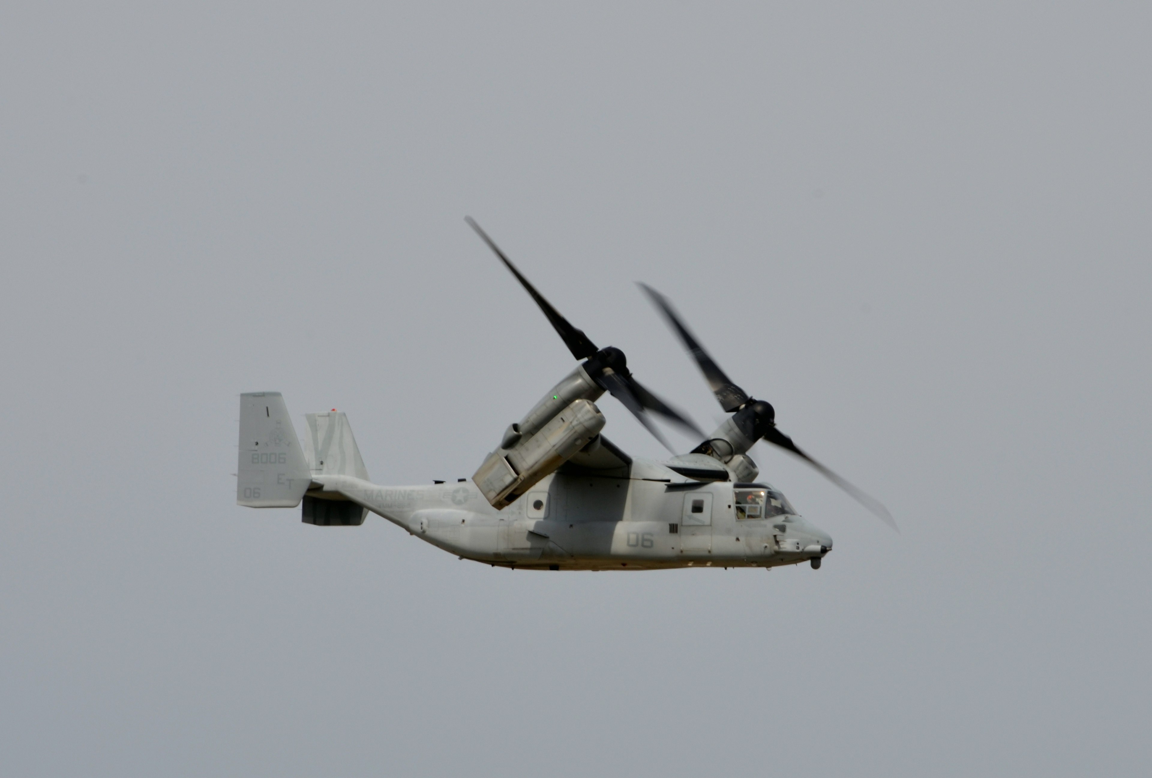 Military Osprey aircraft flying in the sky