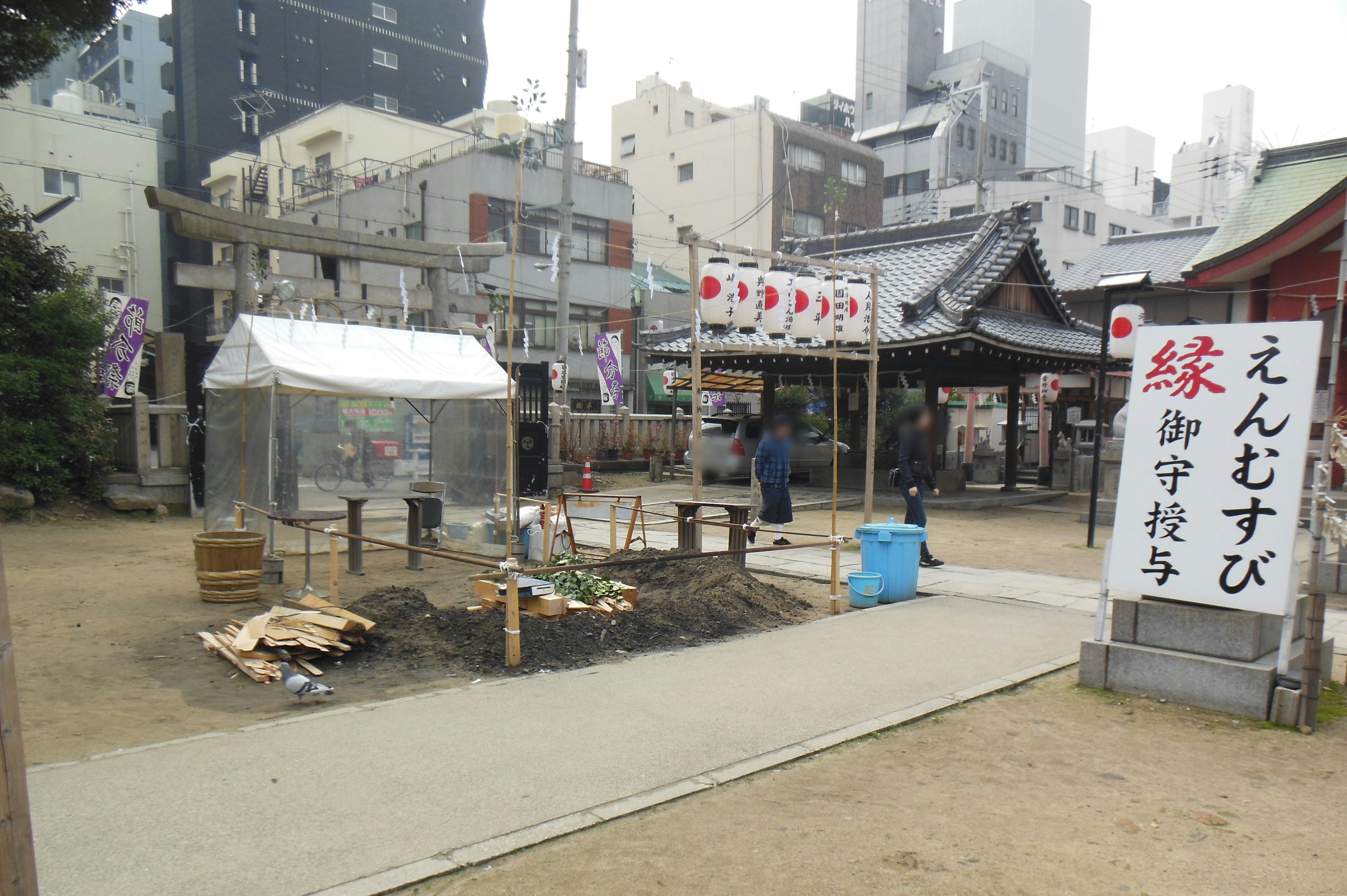 Urban shrine scene with outdoor festival preparations