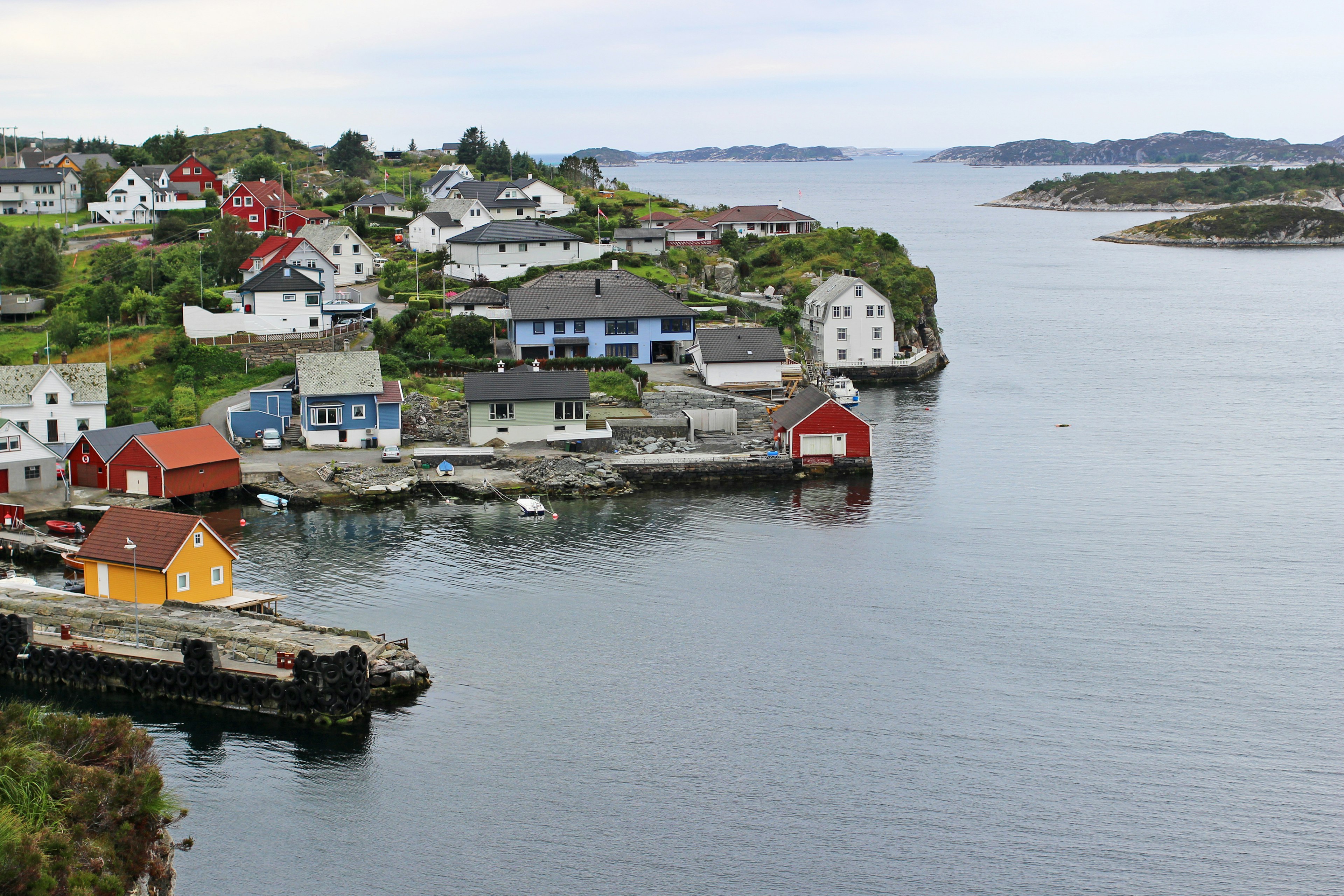 Scenic view of a Norwegian coastal town colorful houses lining the waterfront