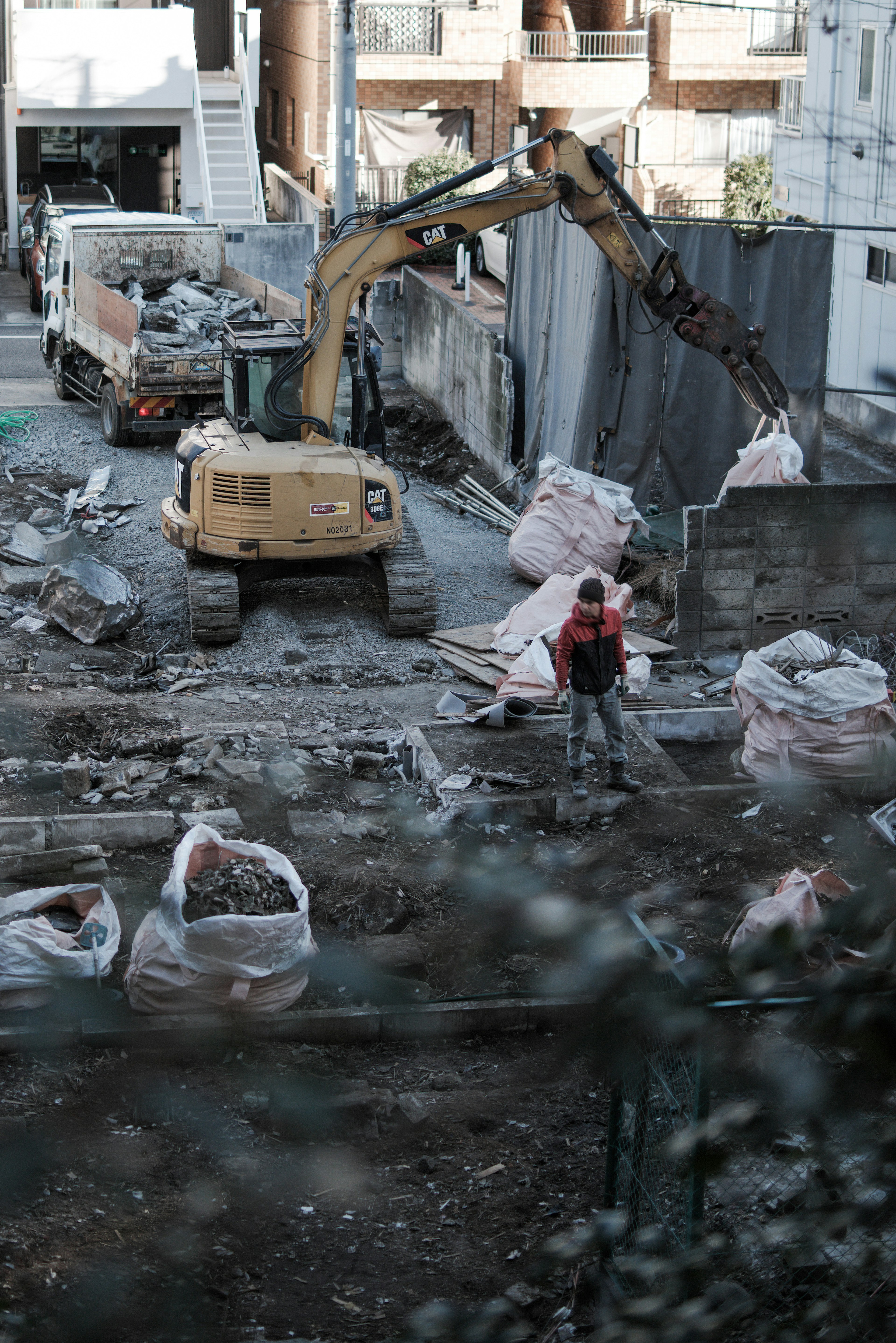 Construction site with heavy machinery and workers