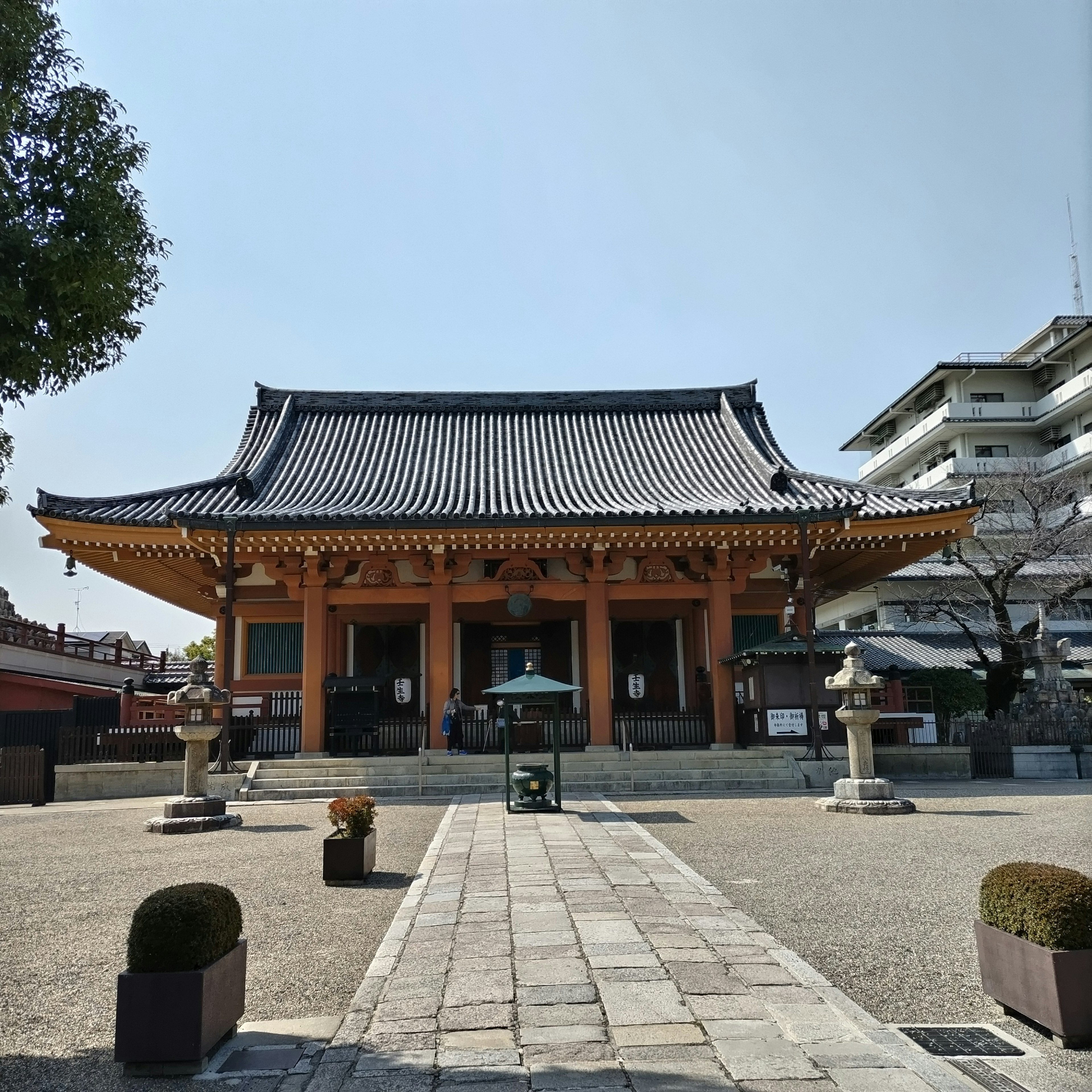 Traditional Japanese temple exterior with decorative eaves and roof