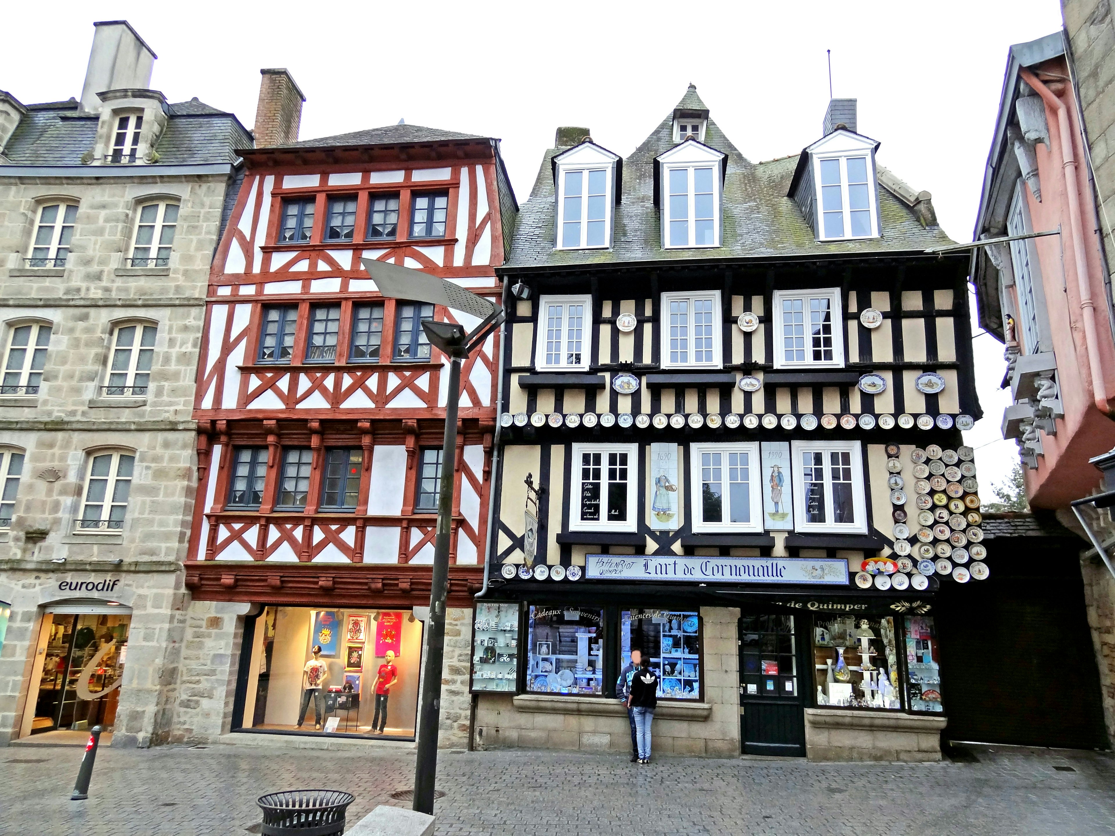 Traditional half-timbered houses in a French town square