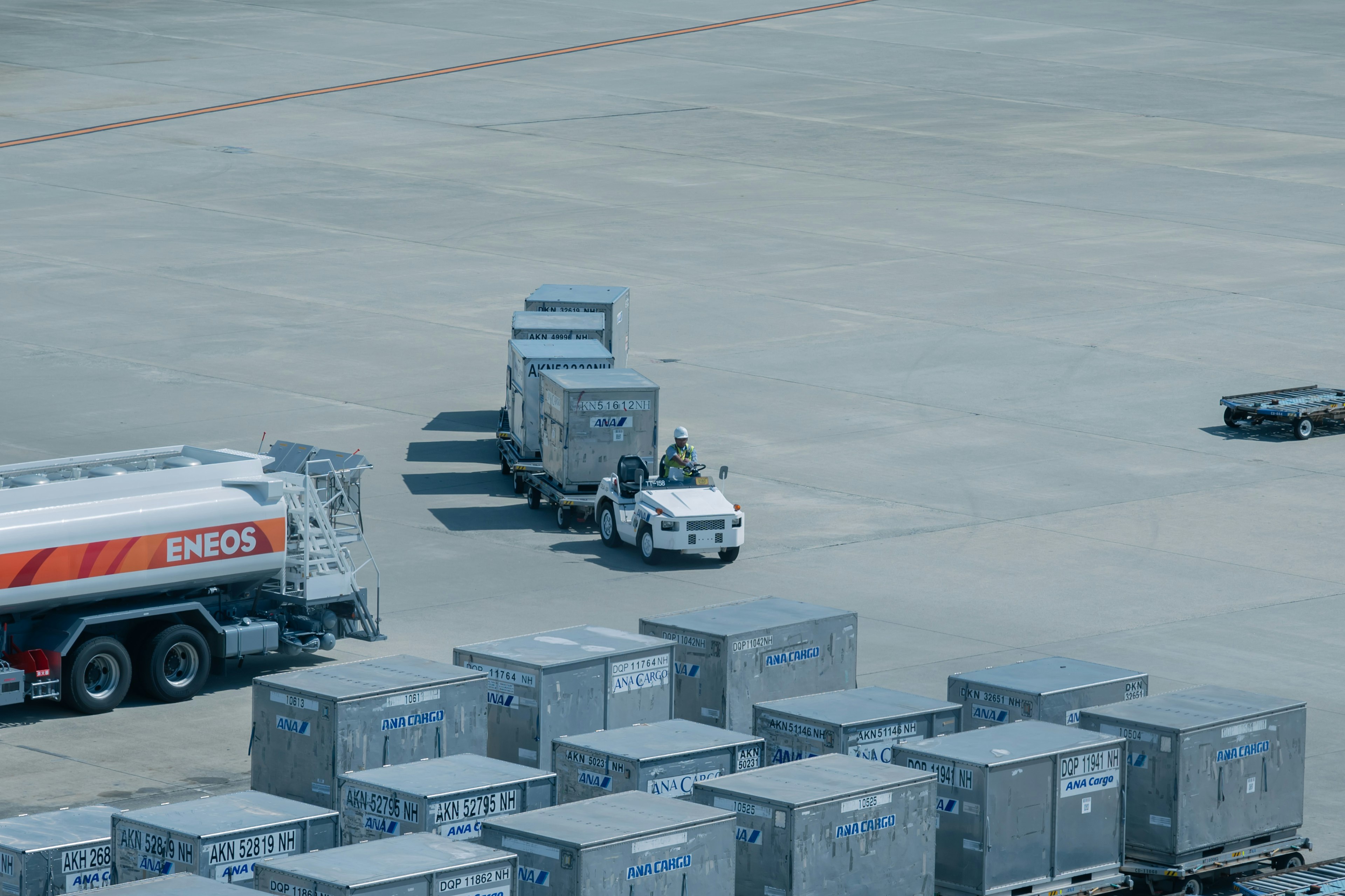 Cargo terminal with a truck transporting containers