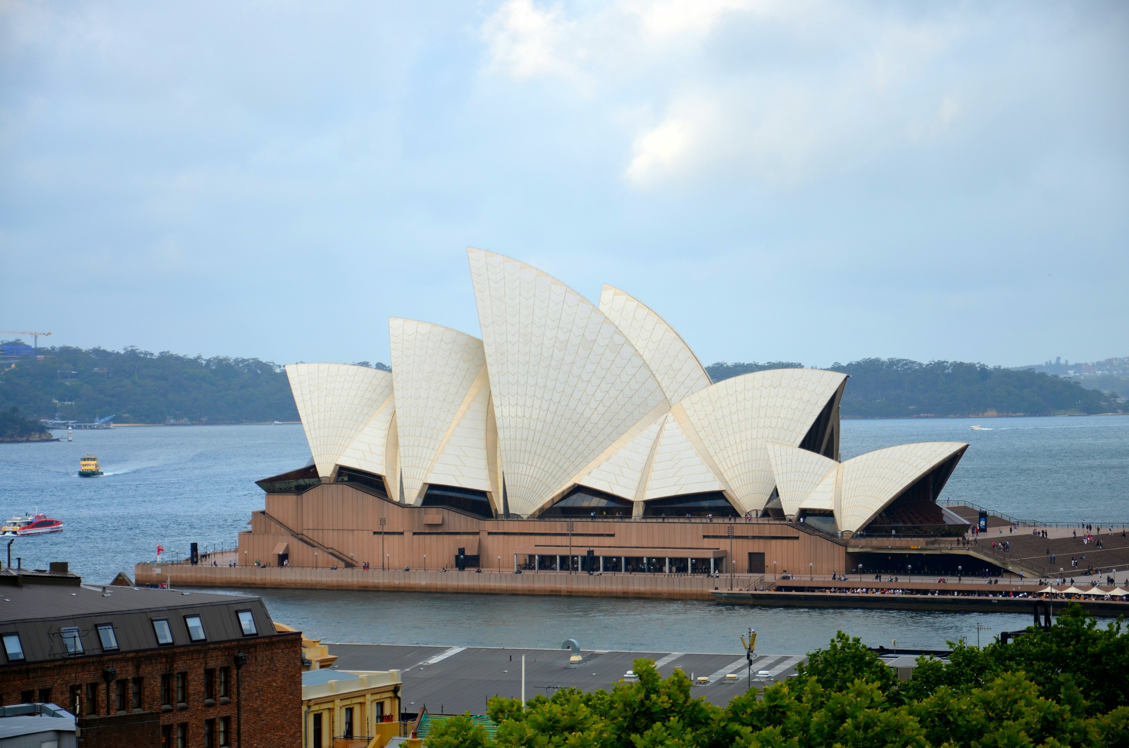 Sydney Opera House with unique architecture and surrounding water