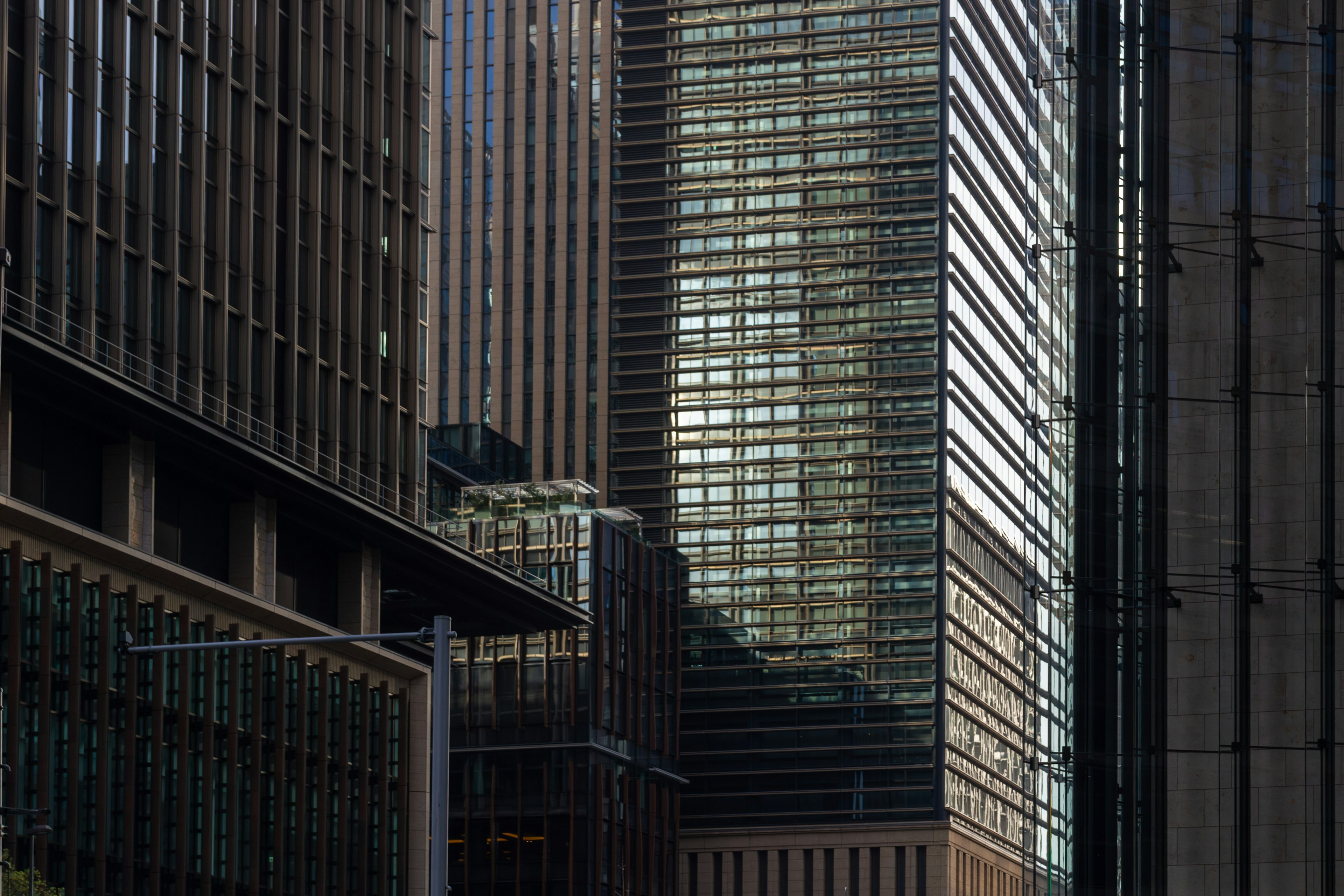 Close-up of skyscrapers showcasing modern architecture and reflections