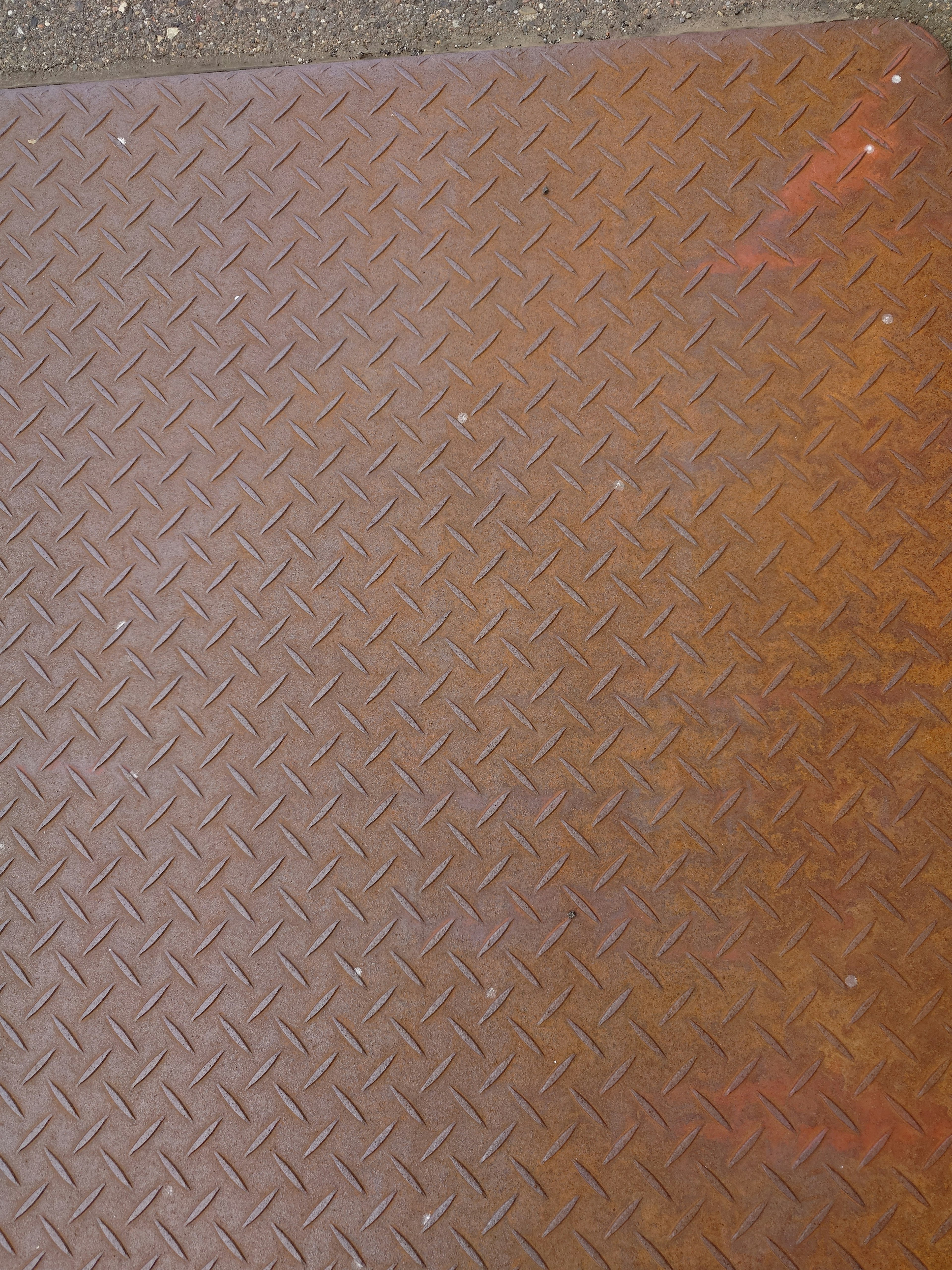 Close-up of a textured brown flooring material