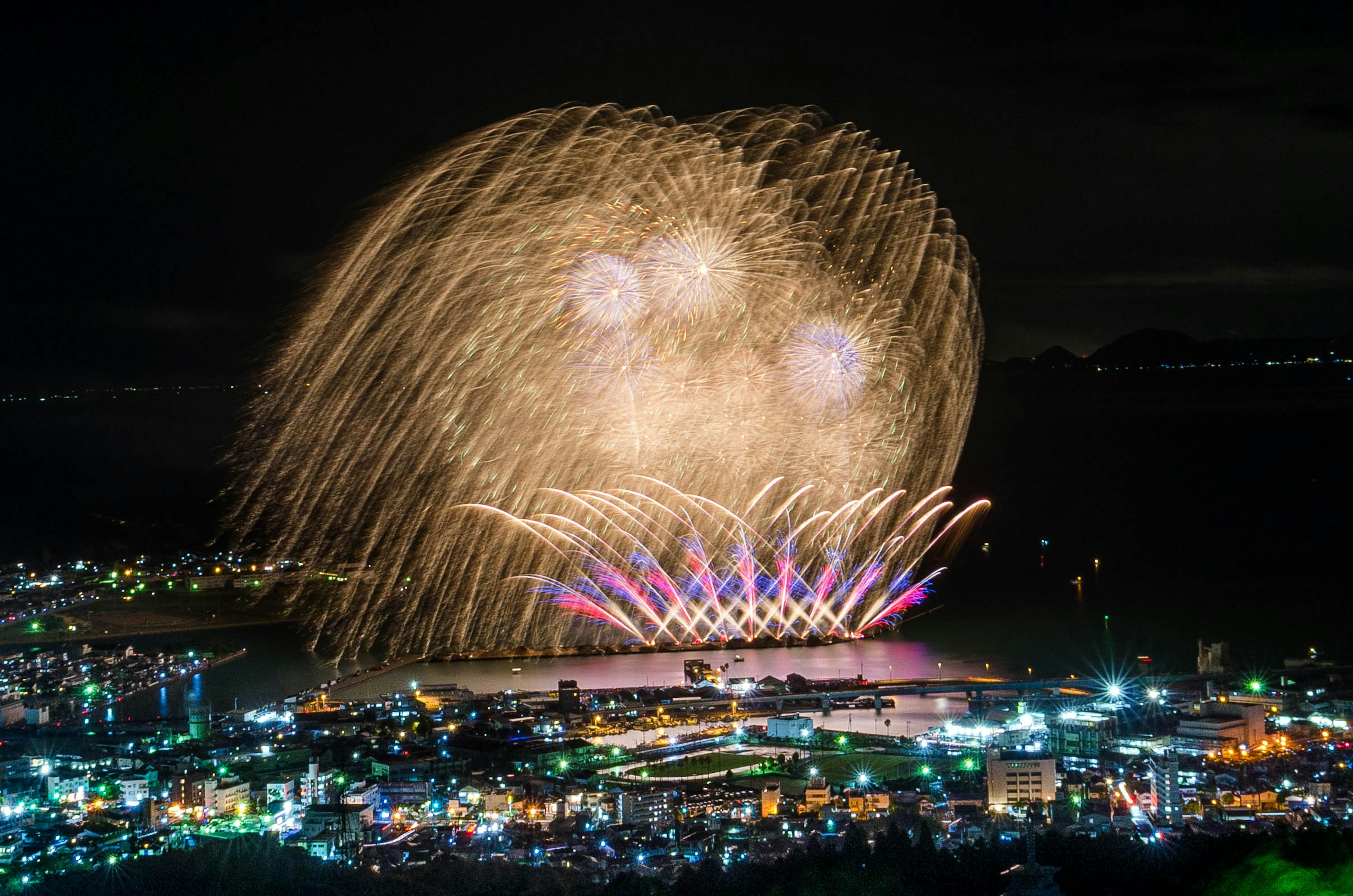 Spectacular fireworks display illuminating the night sky with vibrant colors