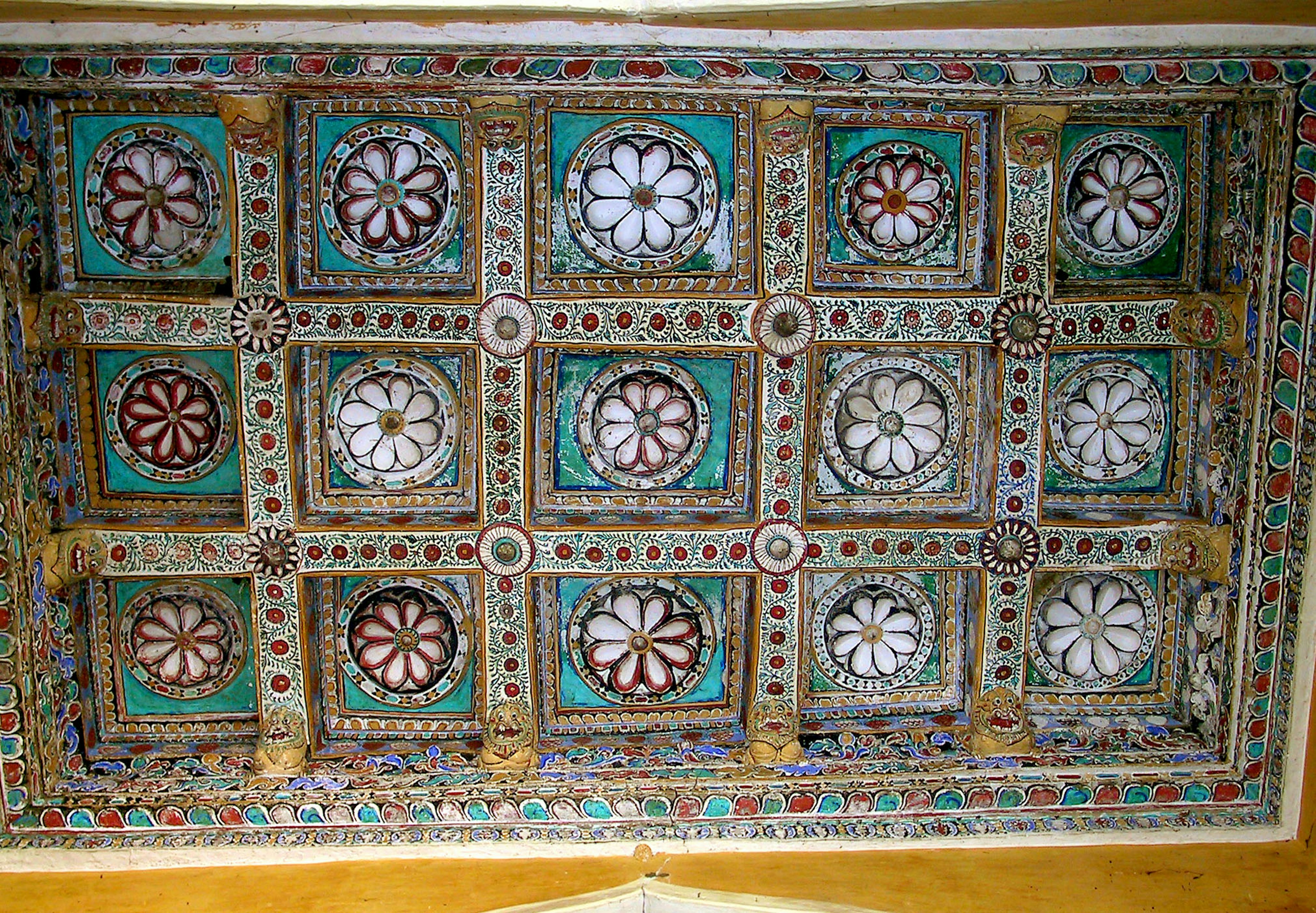 Decorative ceiling design with vibrant colors and intricate patterns