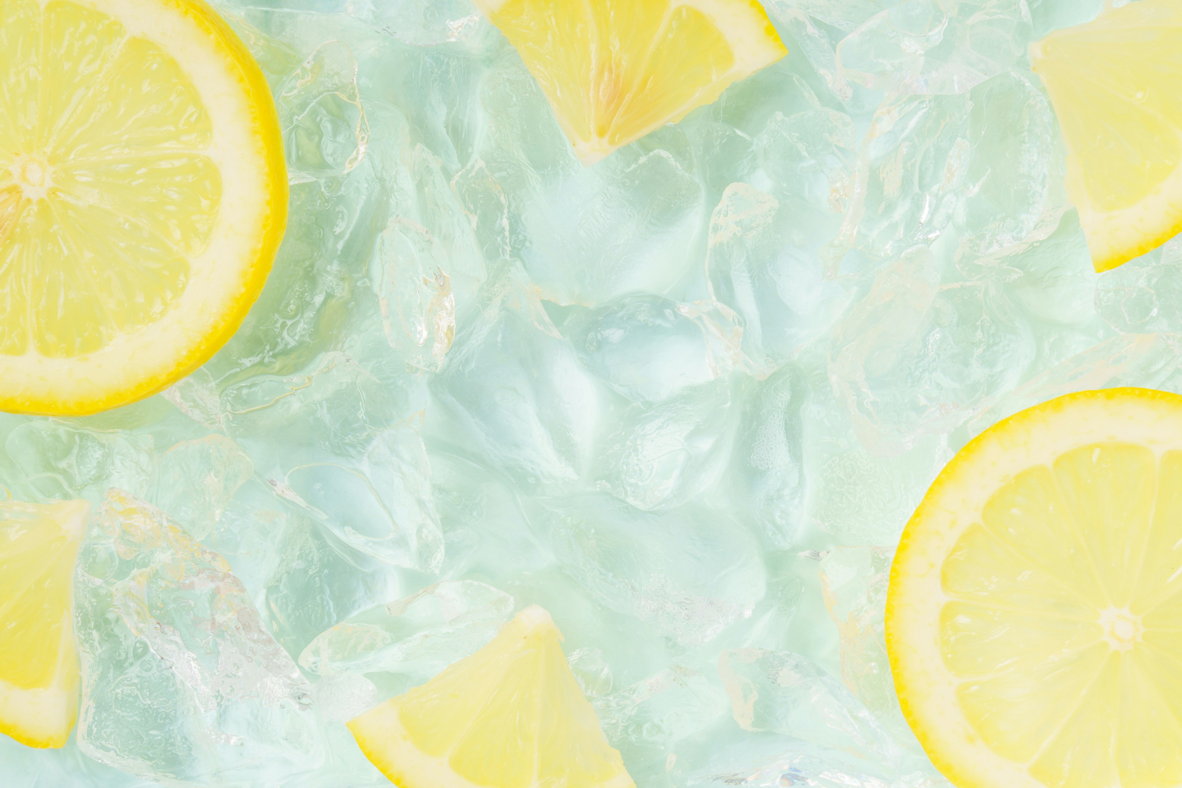 Refreshing image of lemon slices on ice