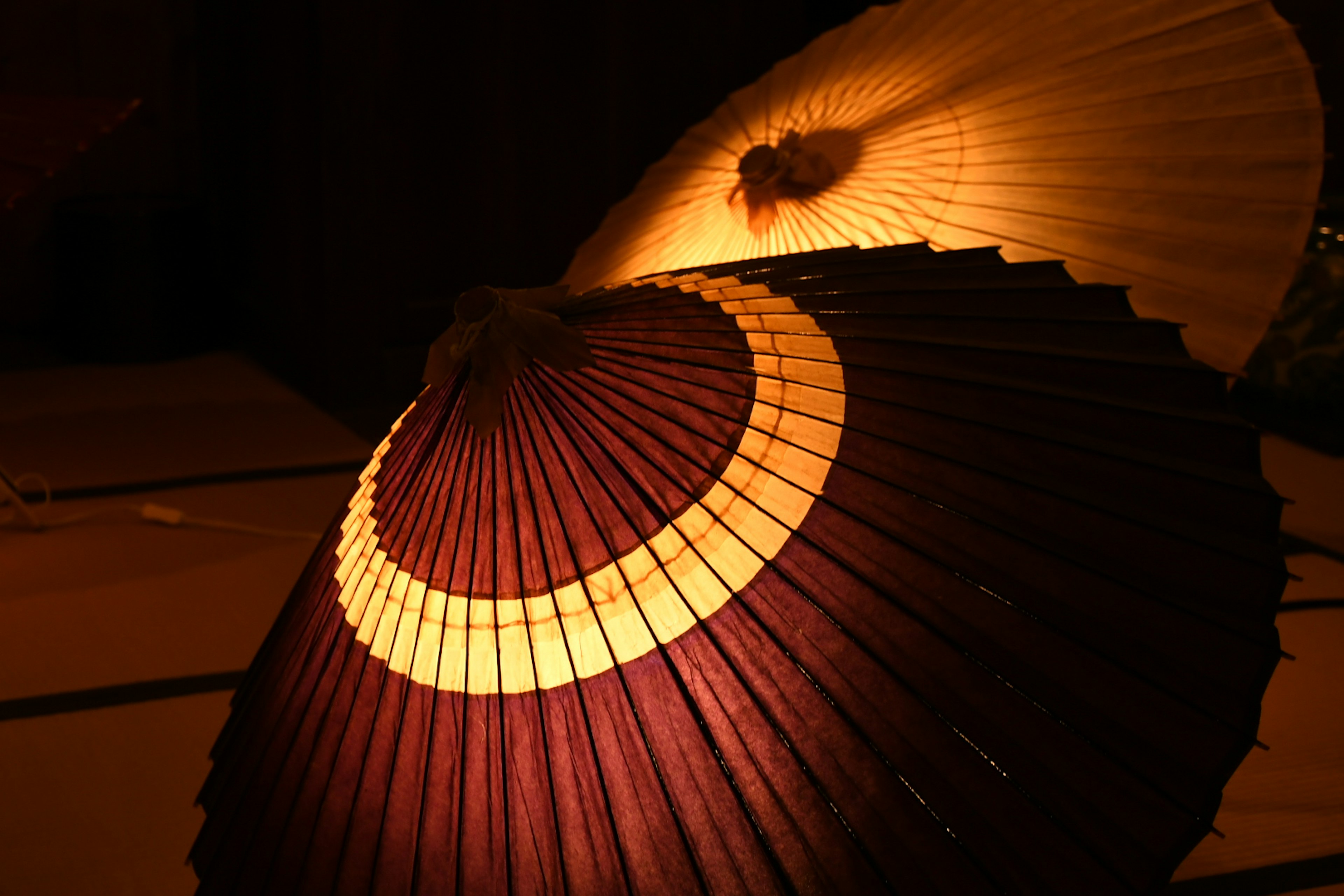 Beautiful design of traditional umbrellas with warm light