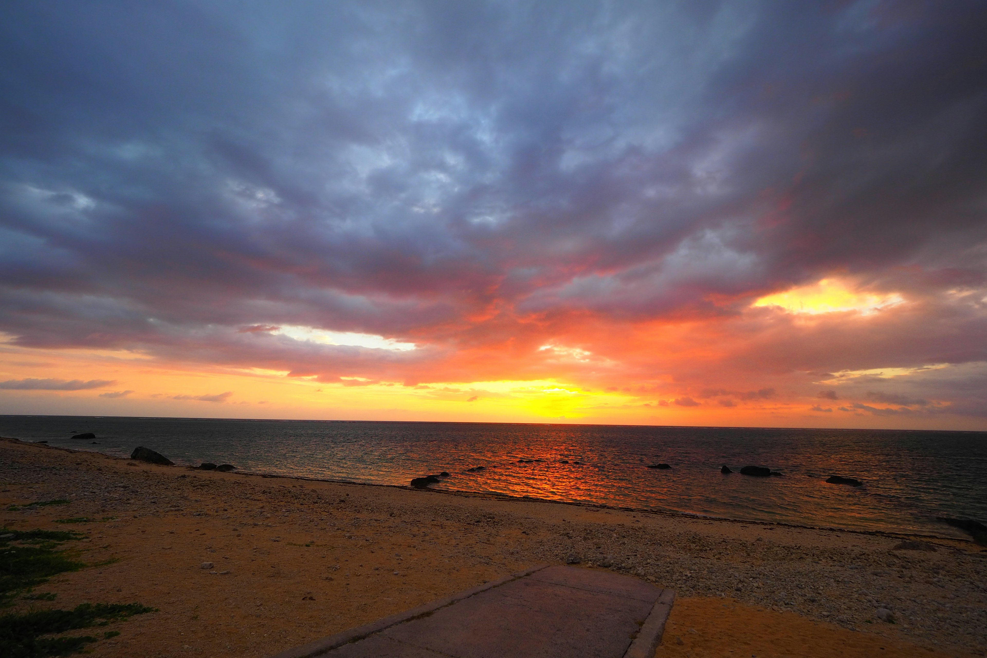 Beautiful sunset over the sea with colorful clouds