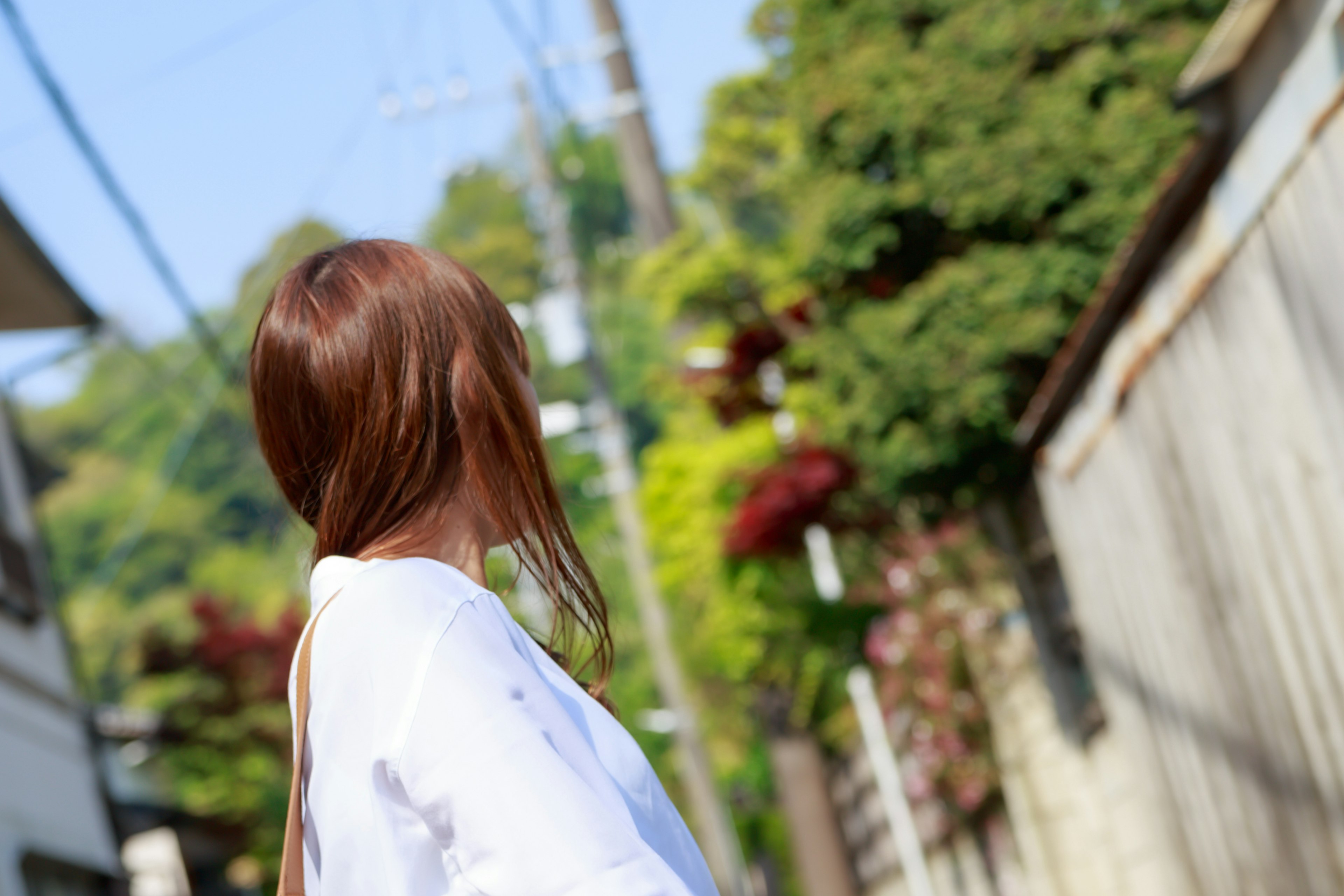 A woman looking back in a street scene