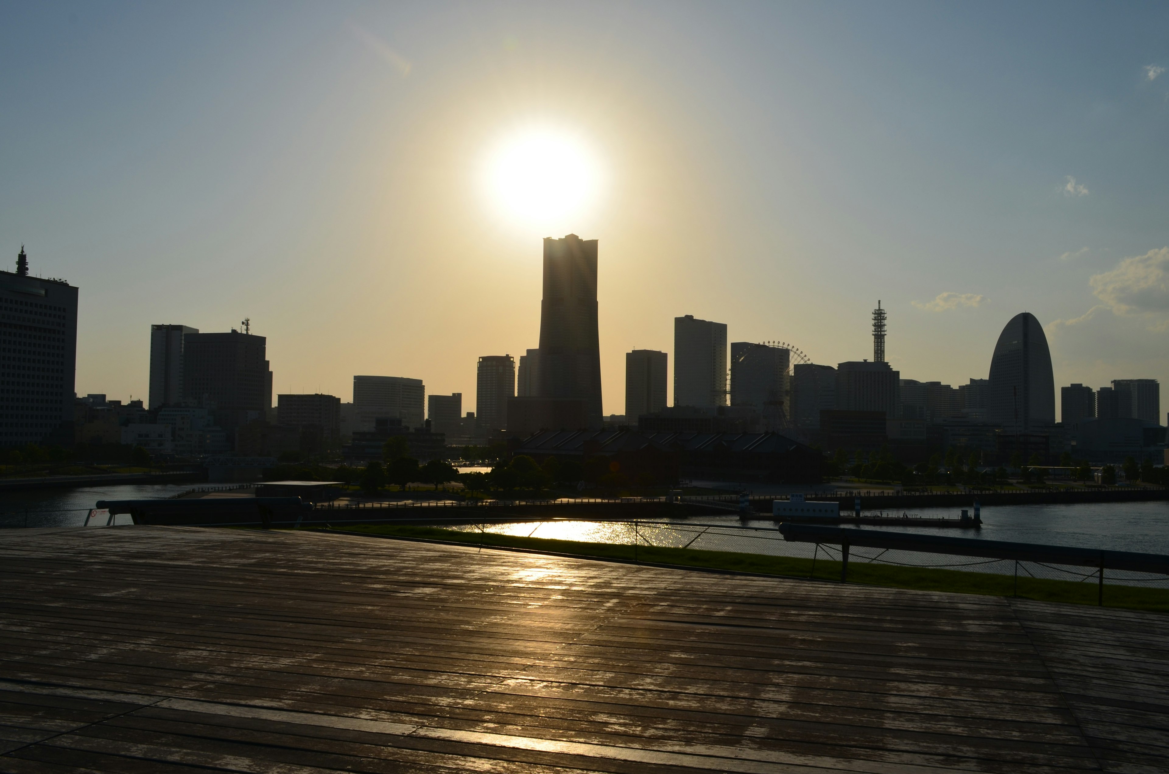 Silhouette of Yokohama skyline against the sunset