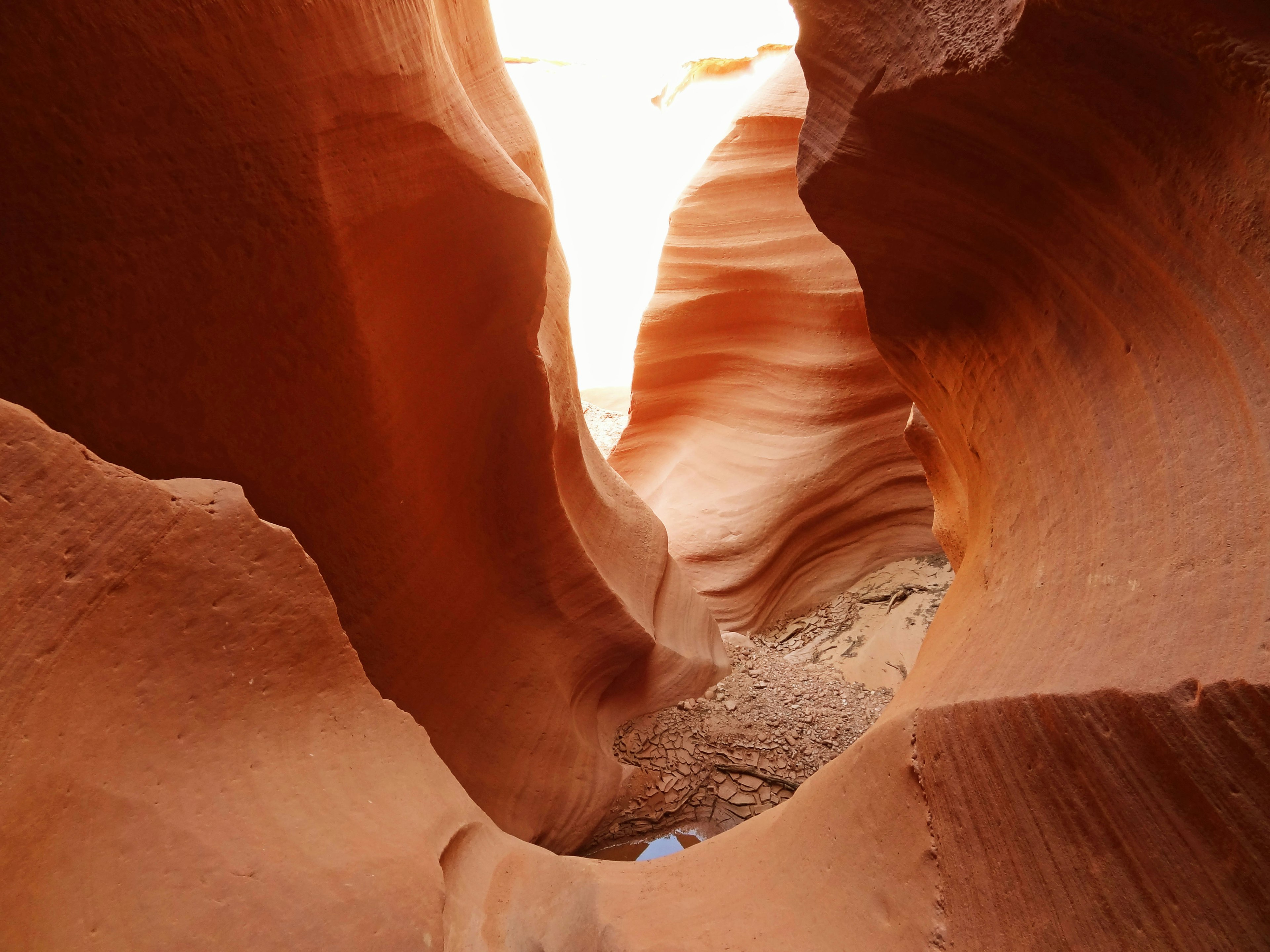 Interior view of a red rock canyon Narrow passage illuminated by light