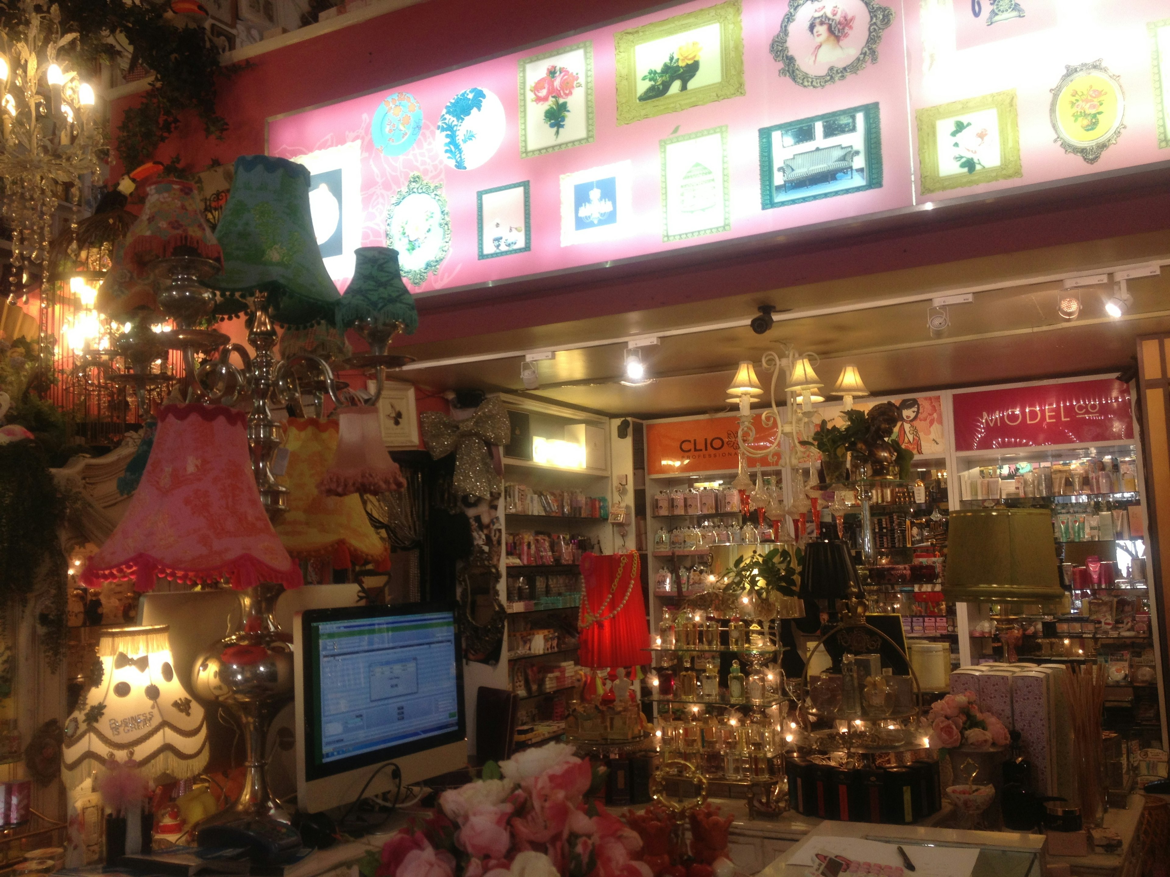 Interior of a shop filled with colorful lamps and decorative items