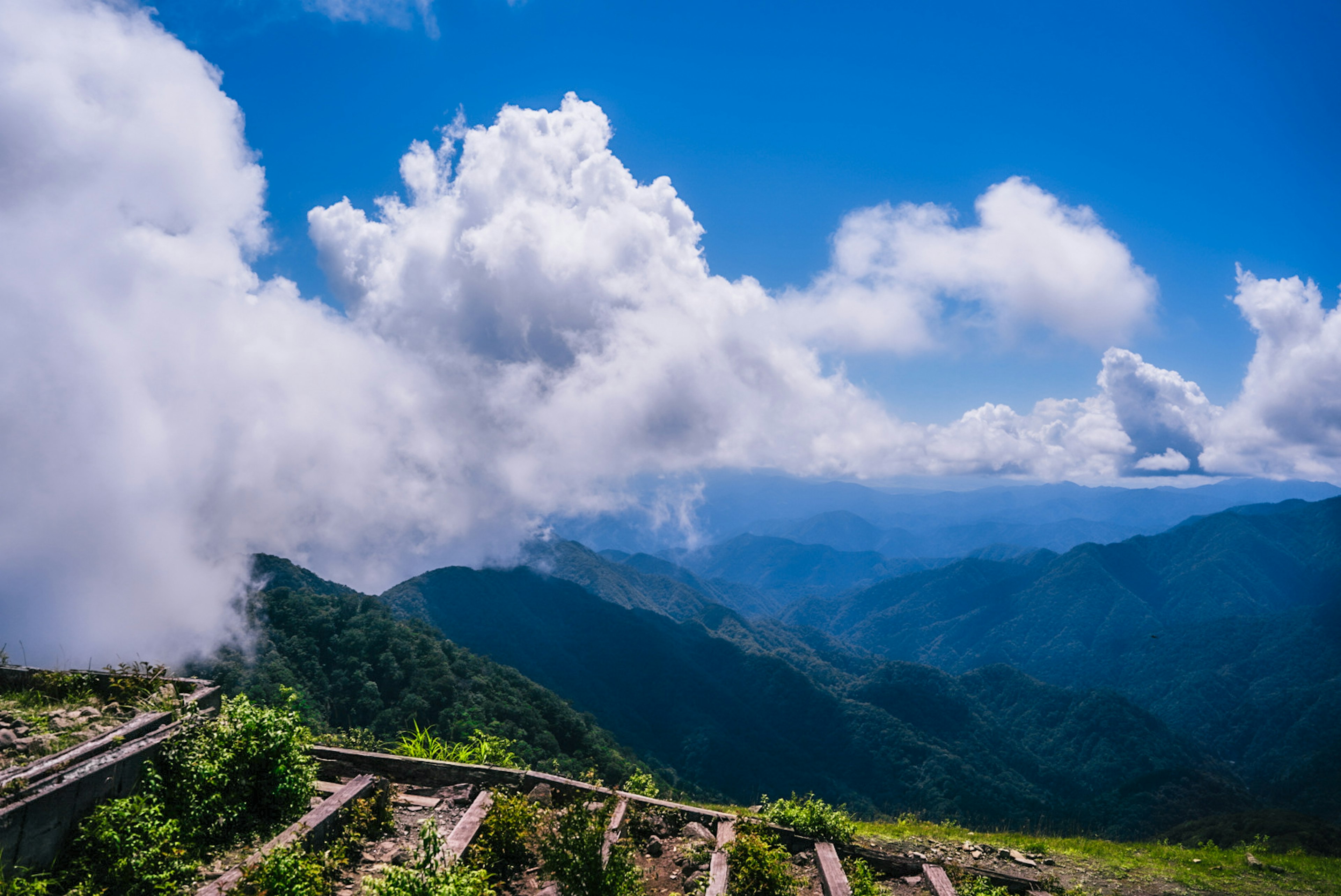 Scenic mountain landscape with blue sky and clouds