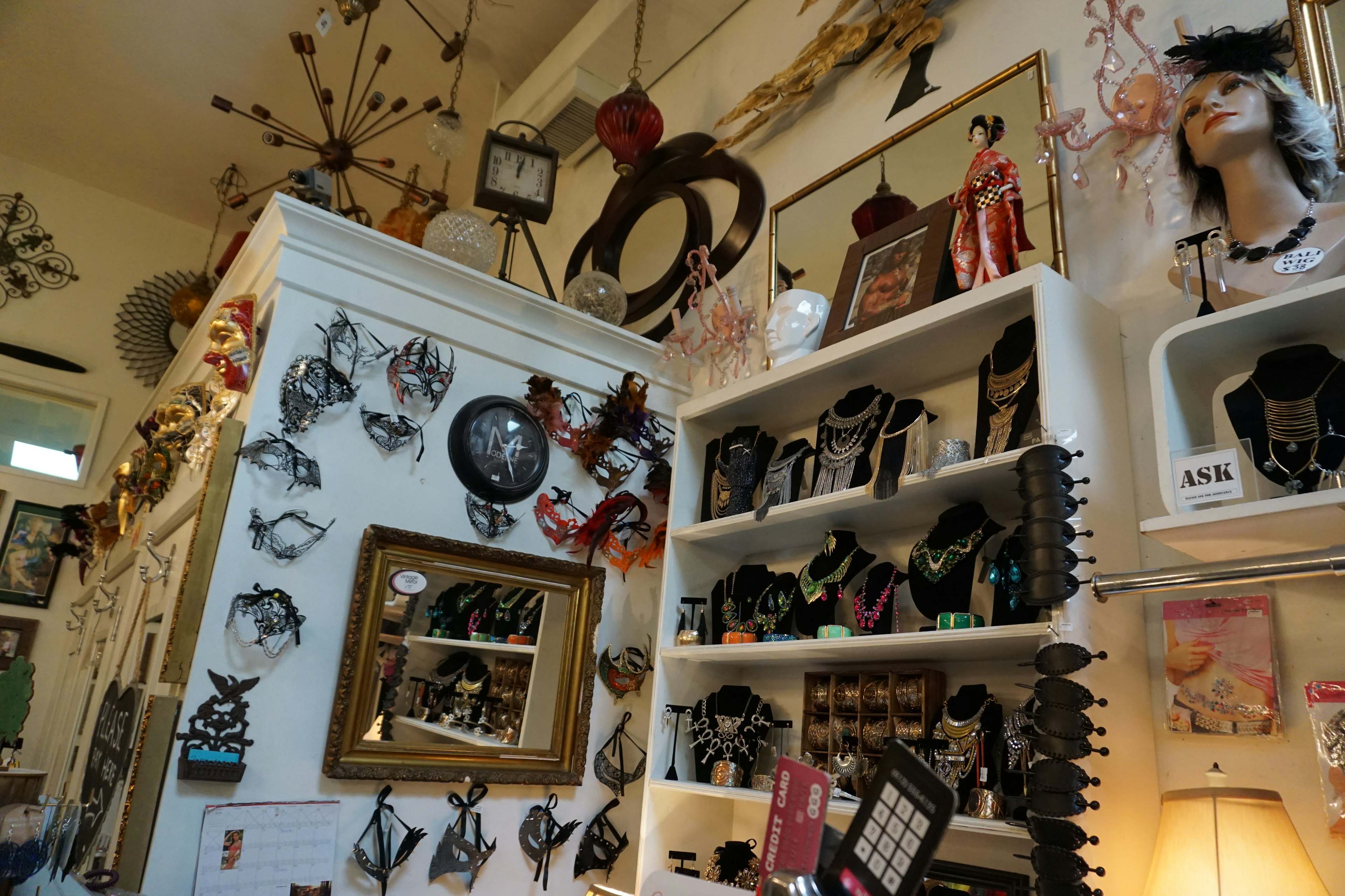 Interior of a shop filled with antique jewelry and decorative items