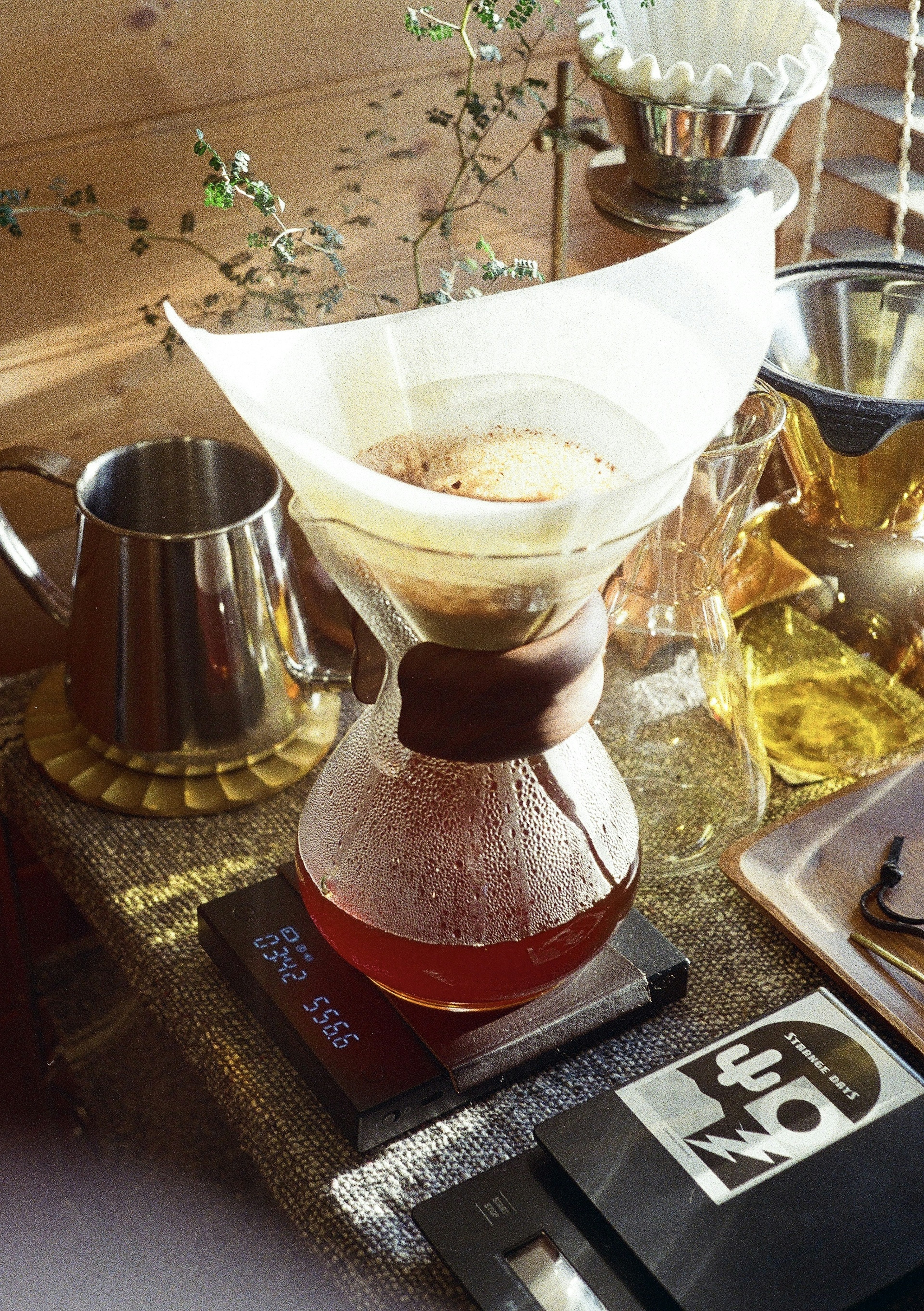 Coffee brewing setup with Chemex and freshly brewed coffee