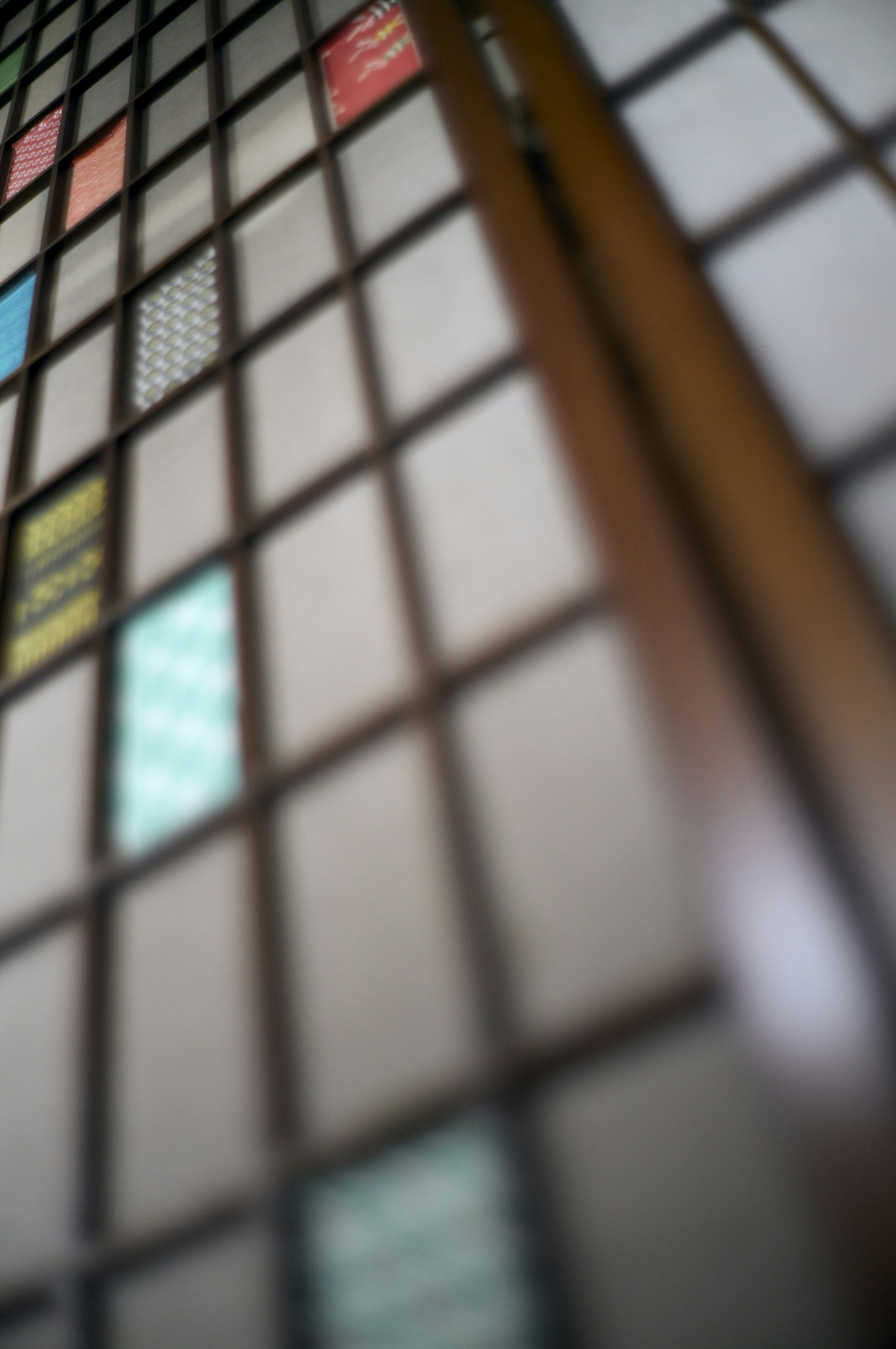 Close-up image of a wall with colorful tiles