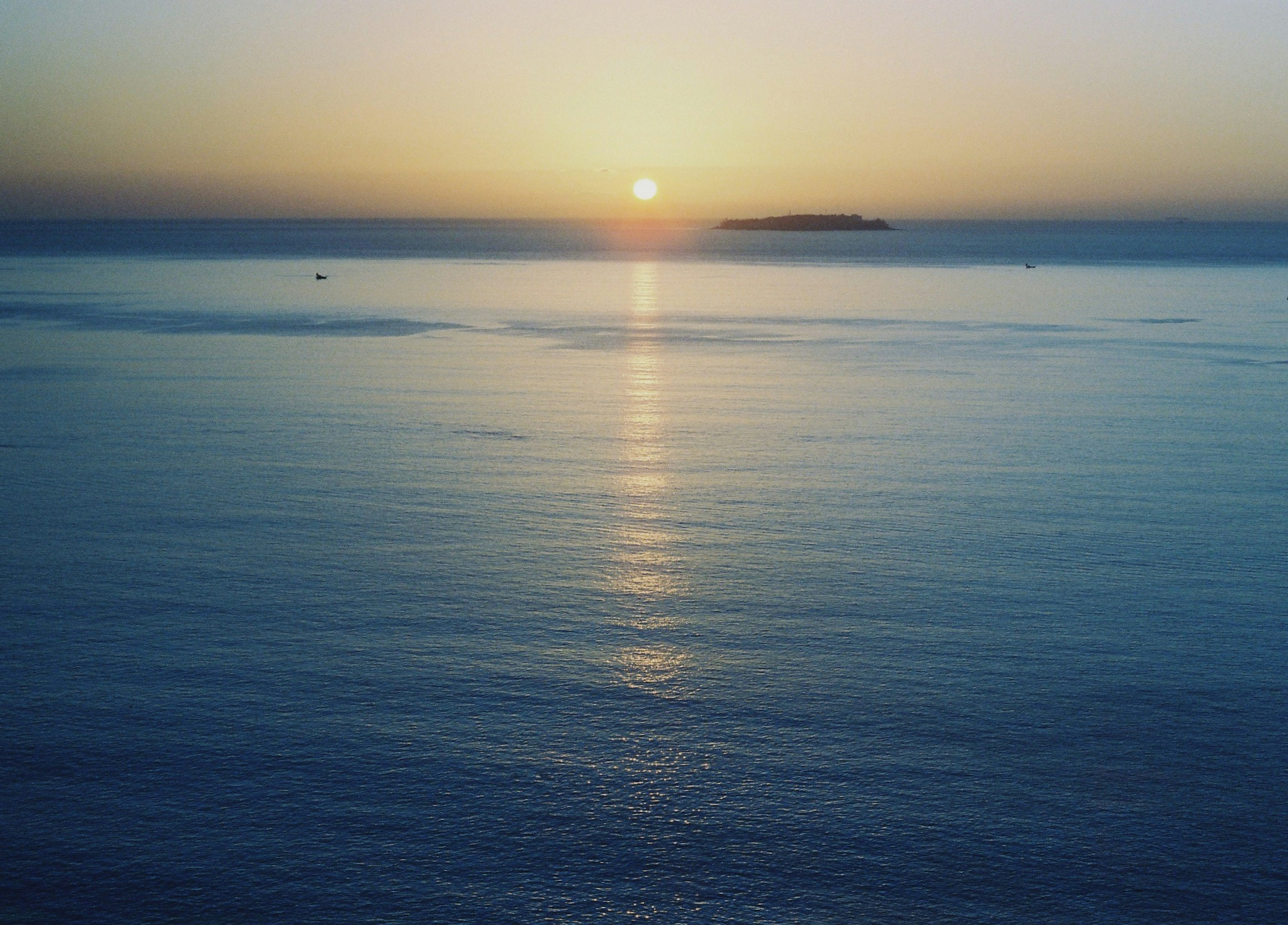 Beautiful sunset over calm ocean waters