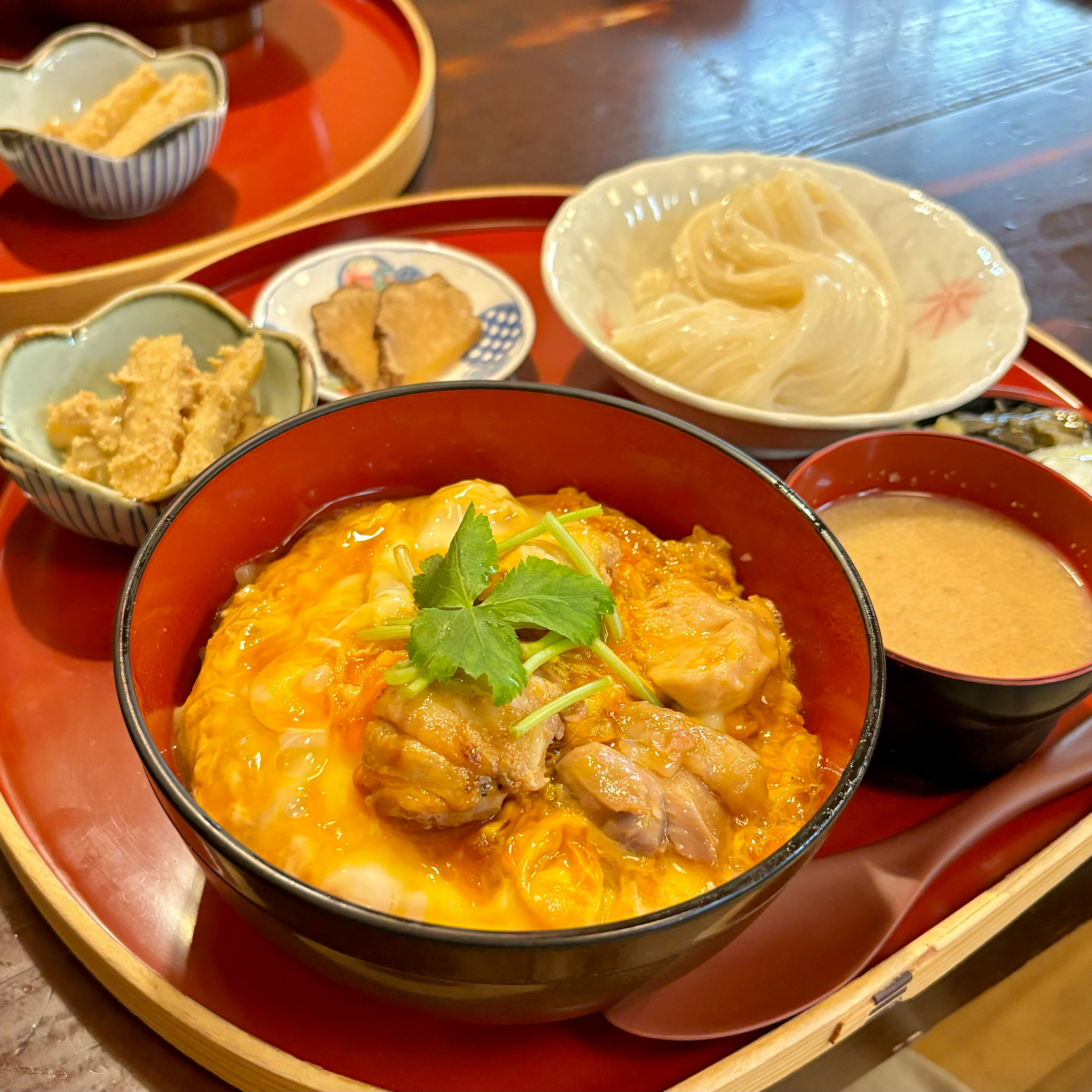 Delicious oyakodon served with side dishes