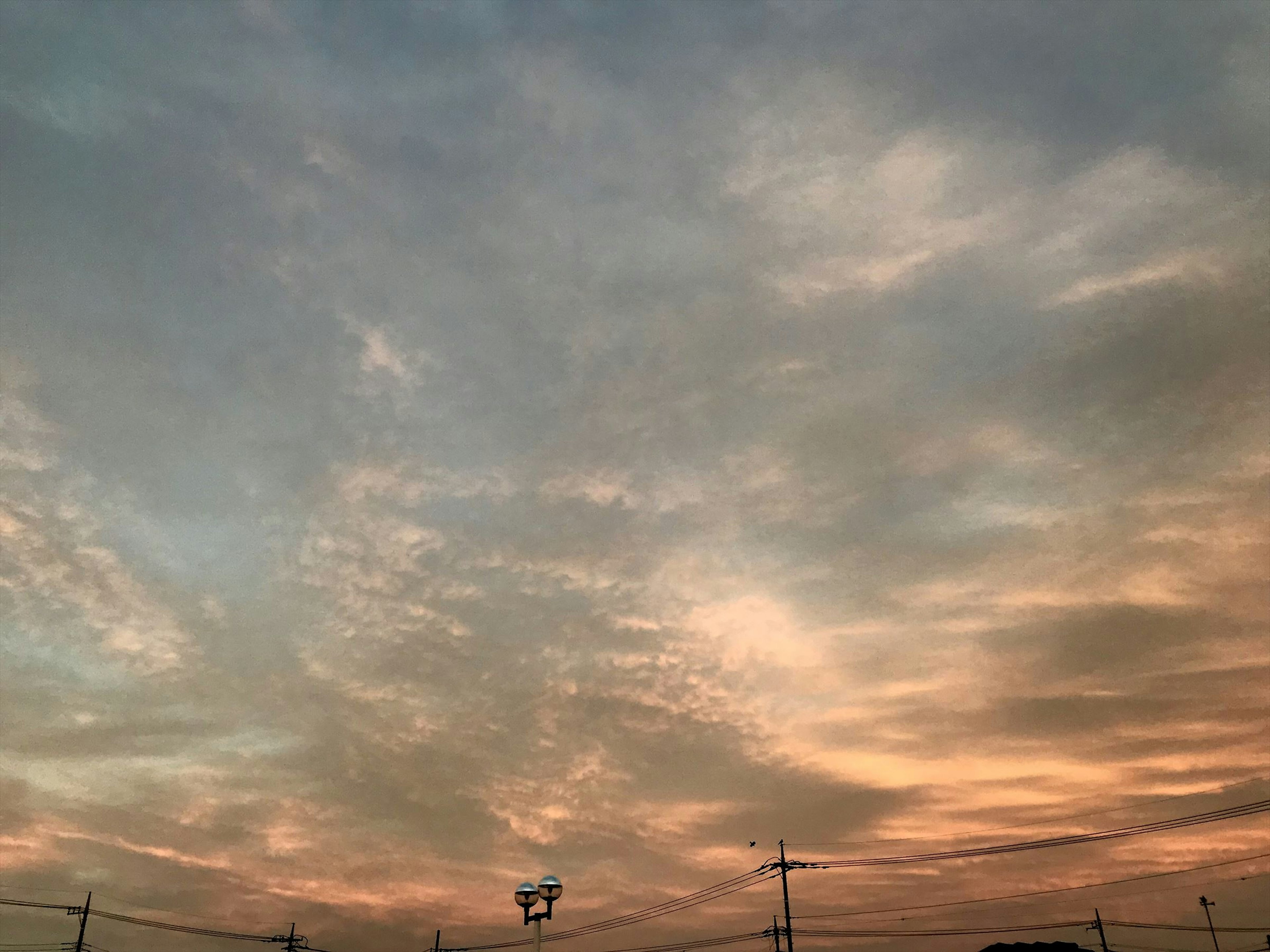 Beautiful sunset sky with shades of blue and orange