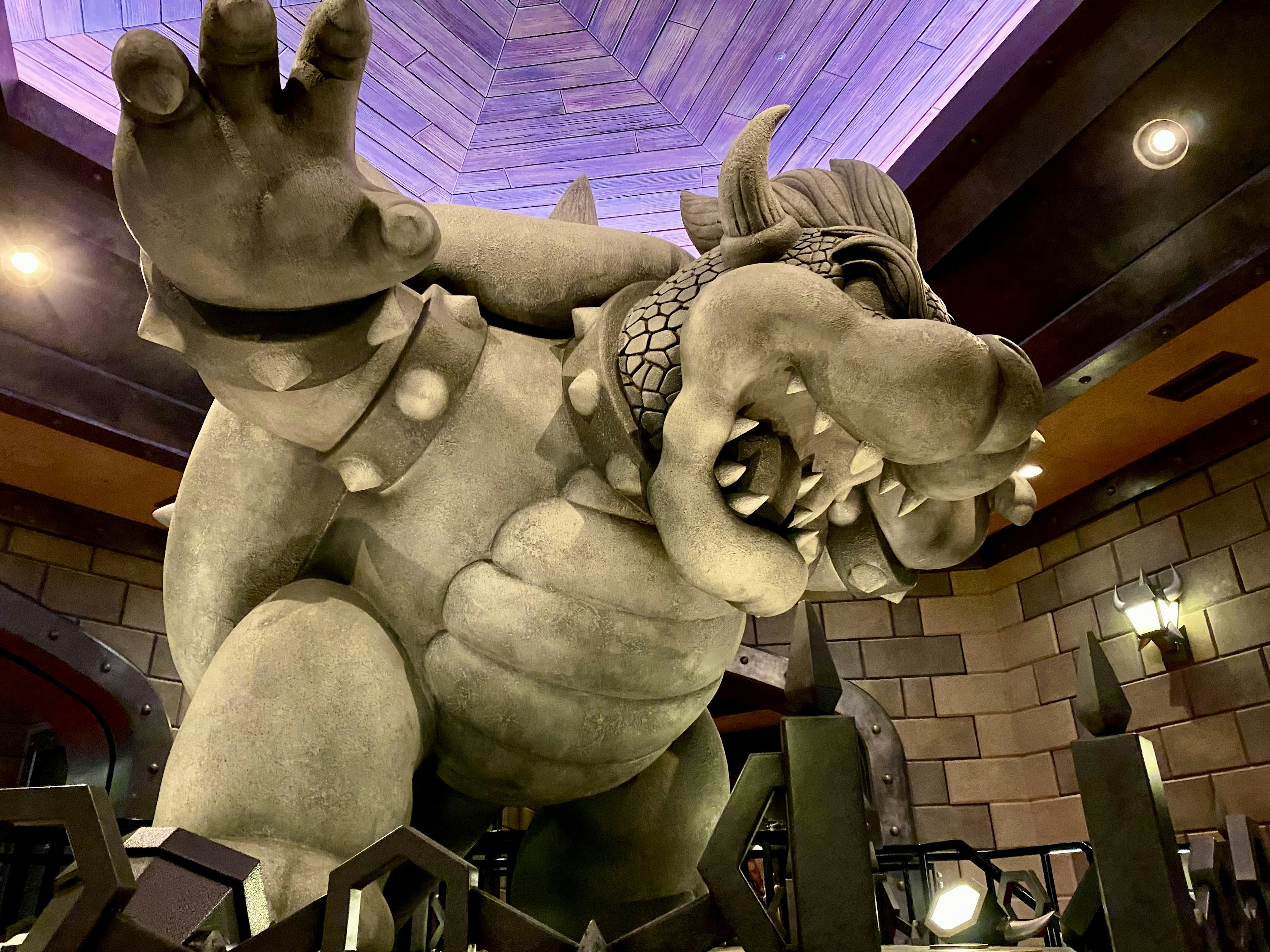 Large monster statue in a themed interior setting