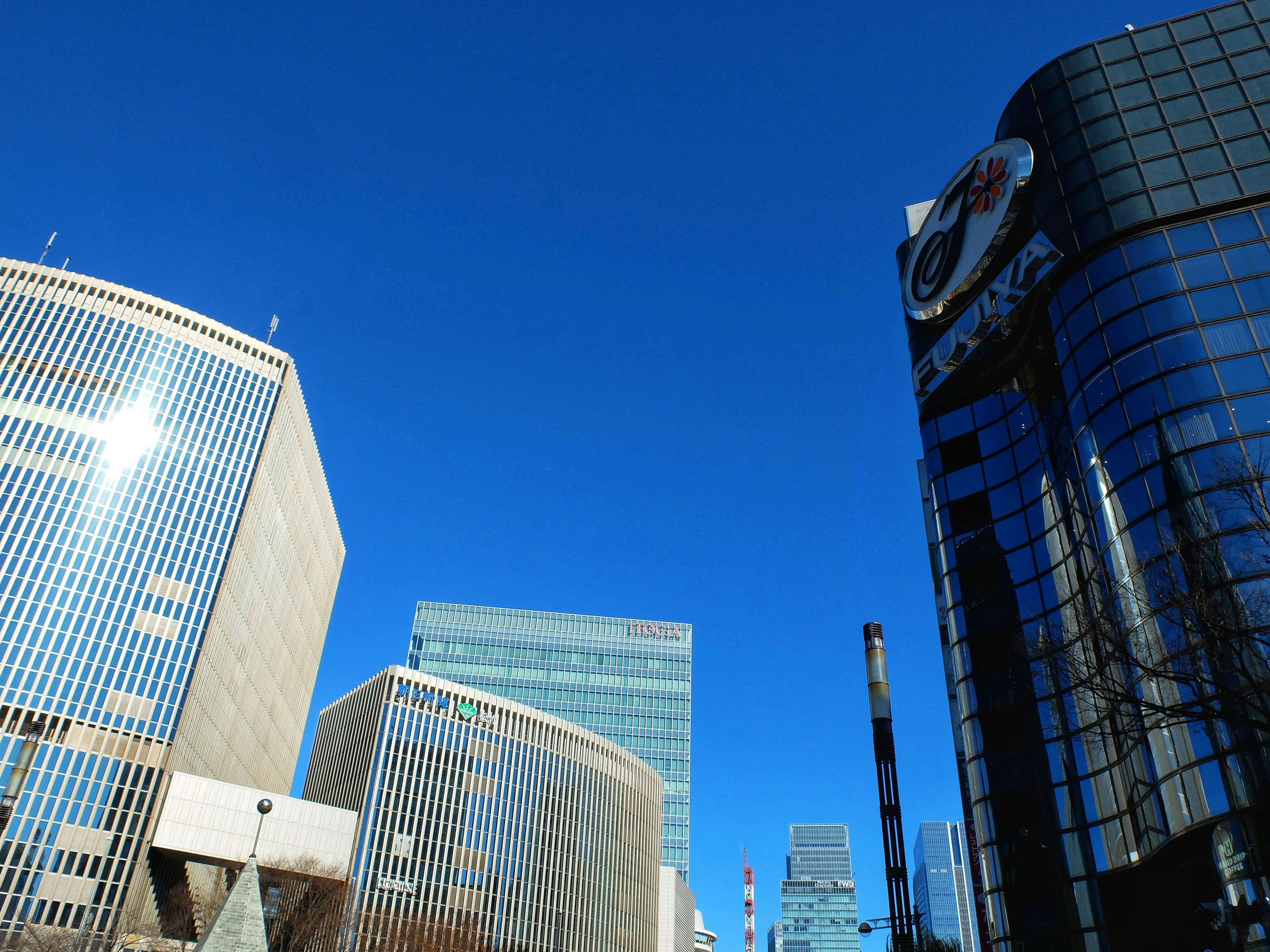 Modern skyscrapers under a clear blue sky