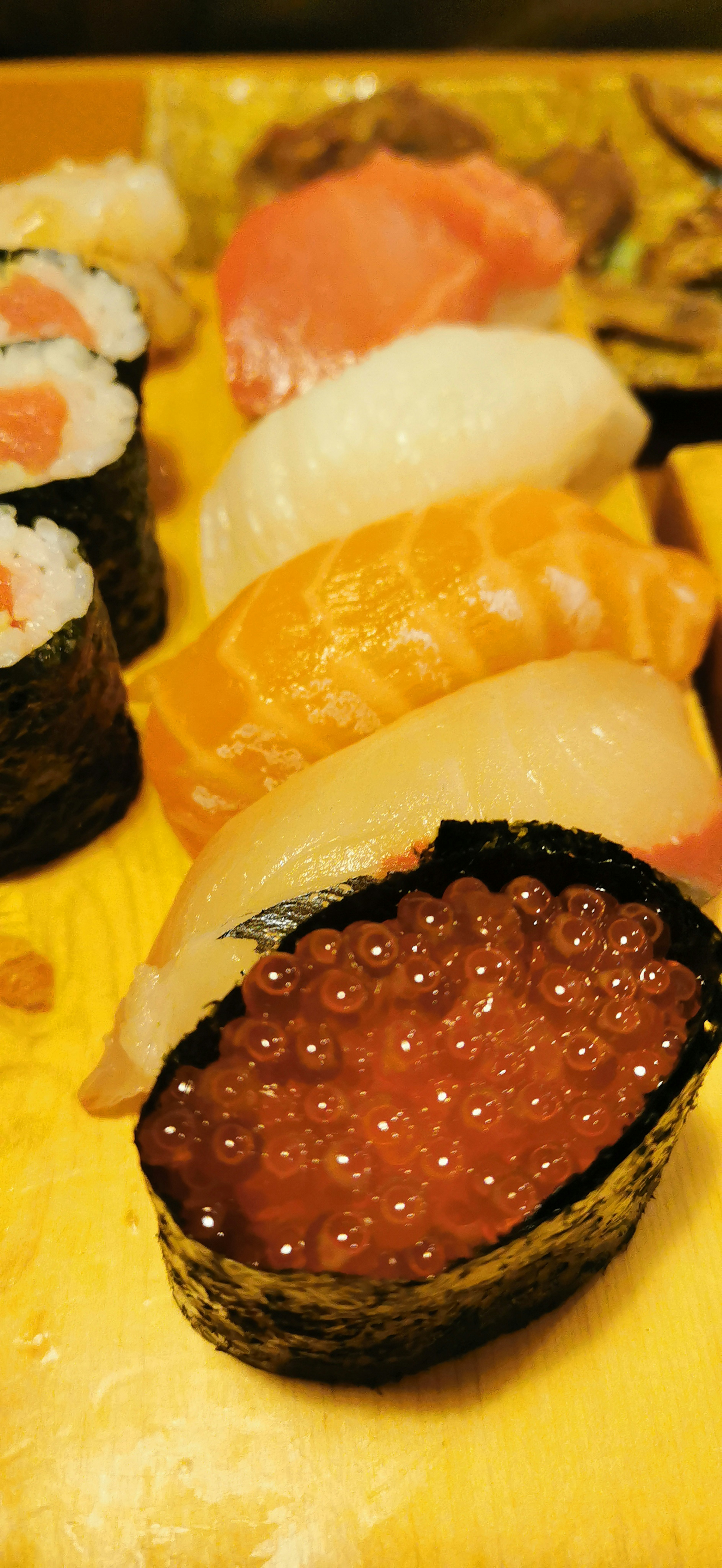 Colorful sushi platter featuring fresh ingredients and beautiful presentation