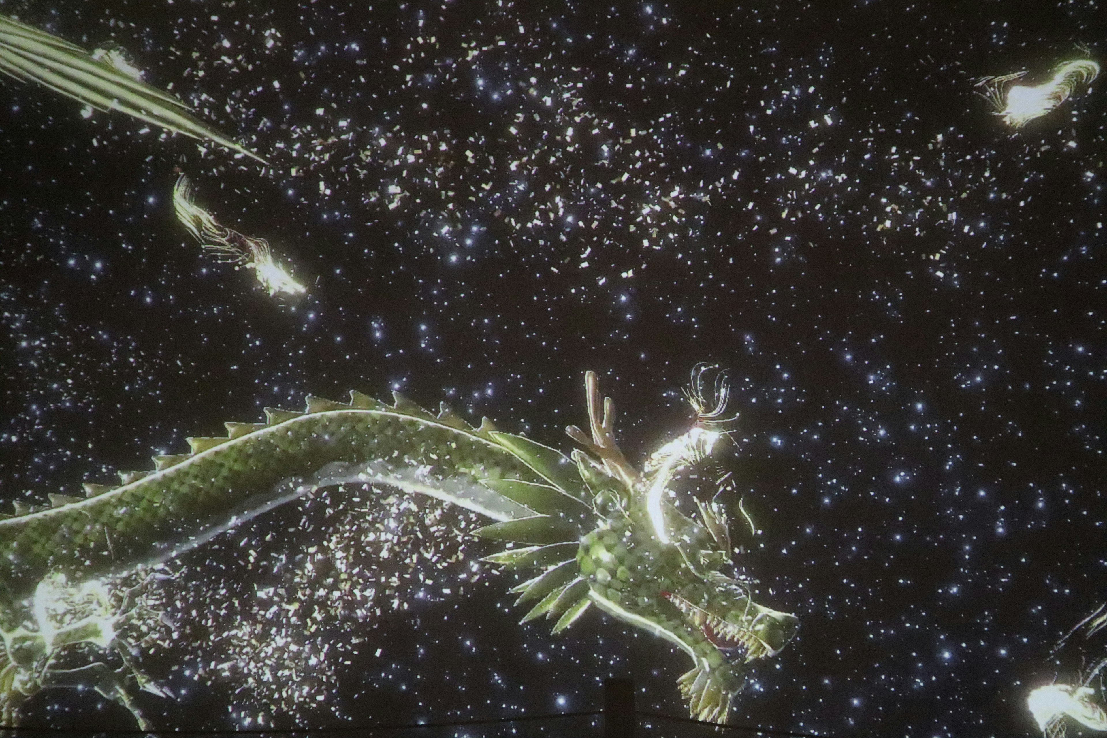 A mystical dragon swimming through the cosmos with stars