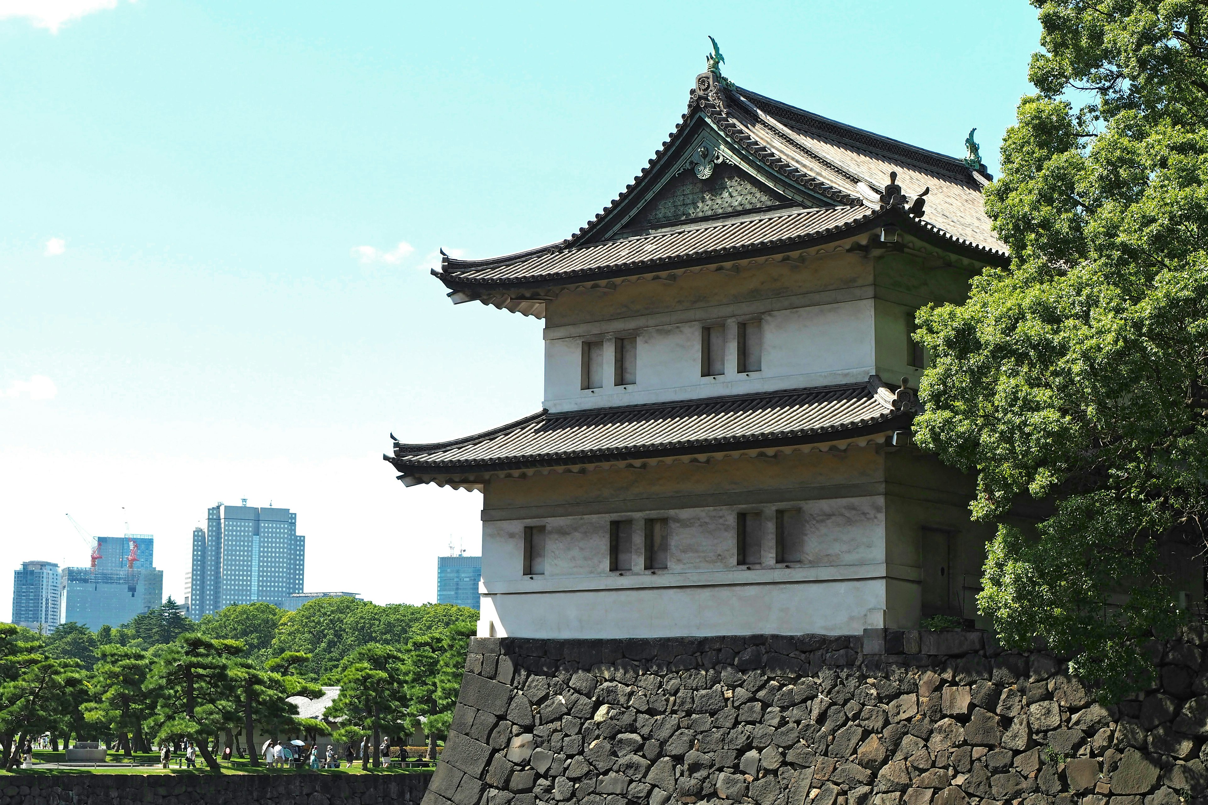 Traditional building part of Tokyo Imperial Palace with stone walls