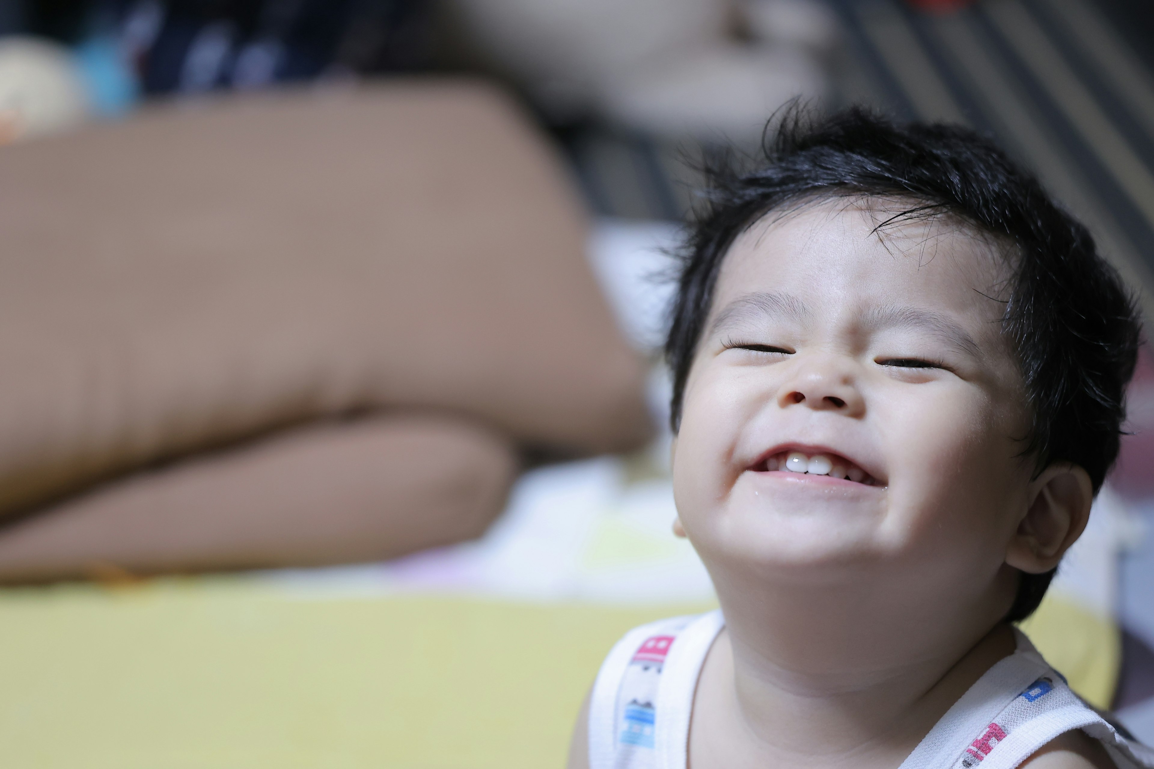 Smiling child displaying joy in a playful setting