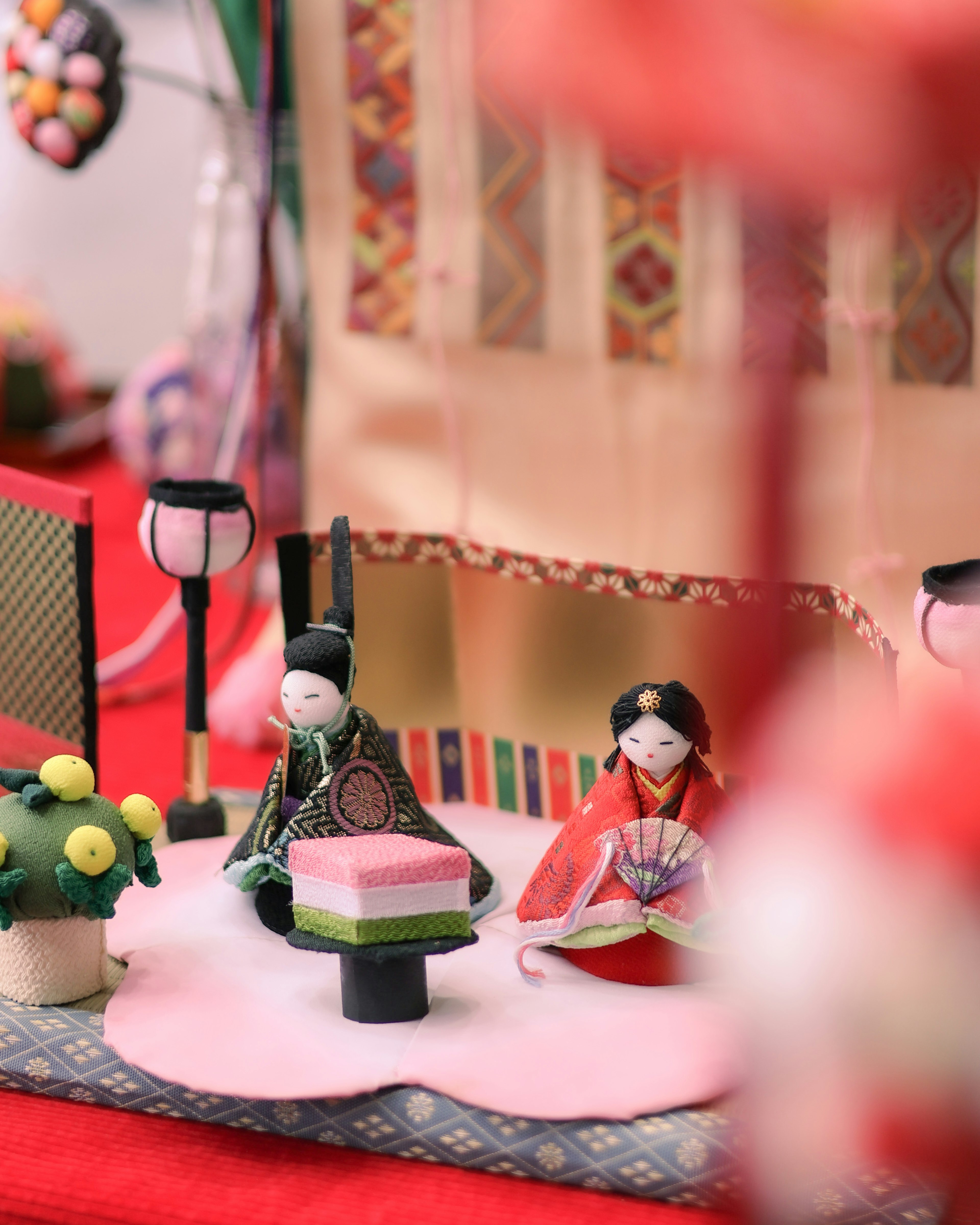 Traditional dolls used for Hina Matsuri decoration are depicted