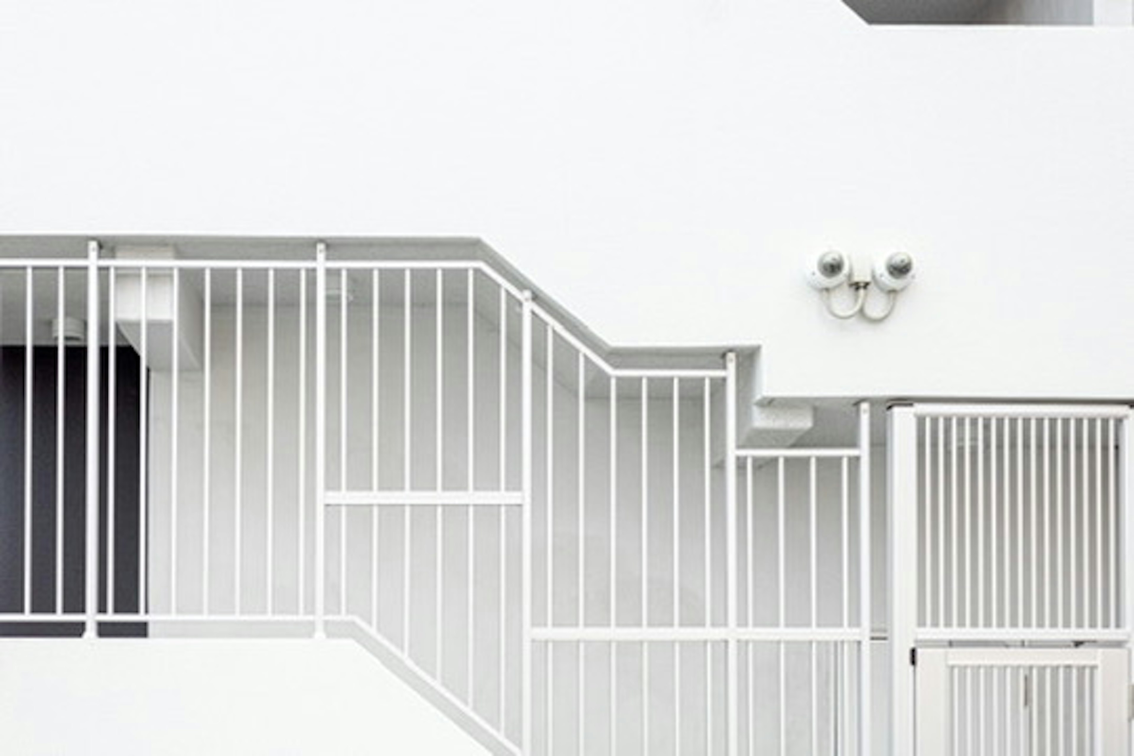 Simple design of white stairs and railings