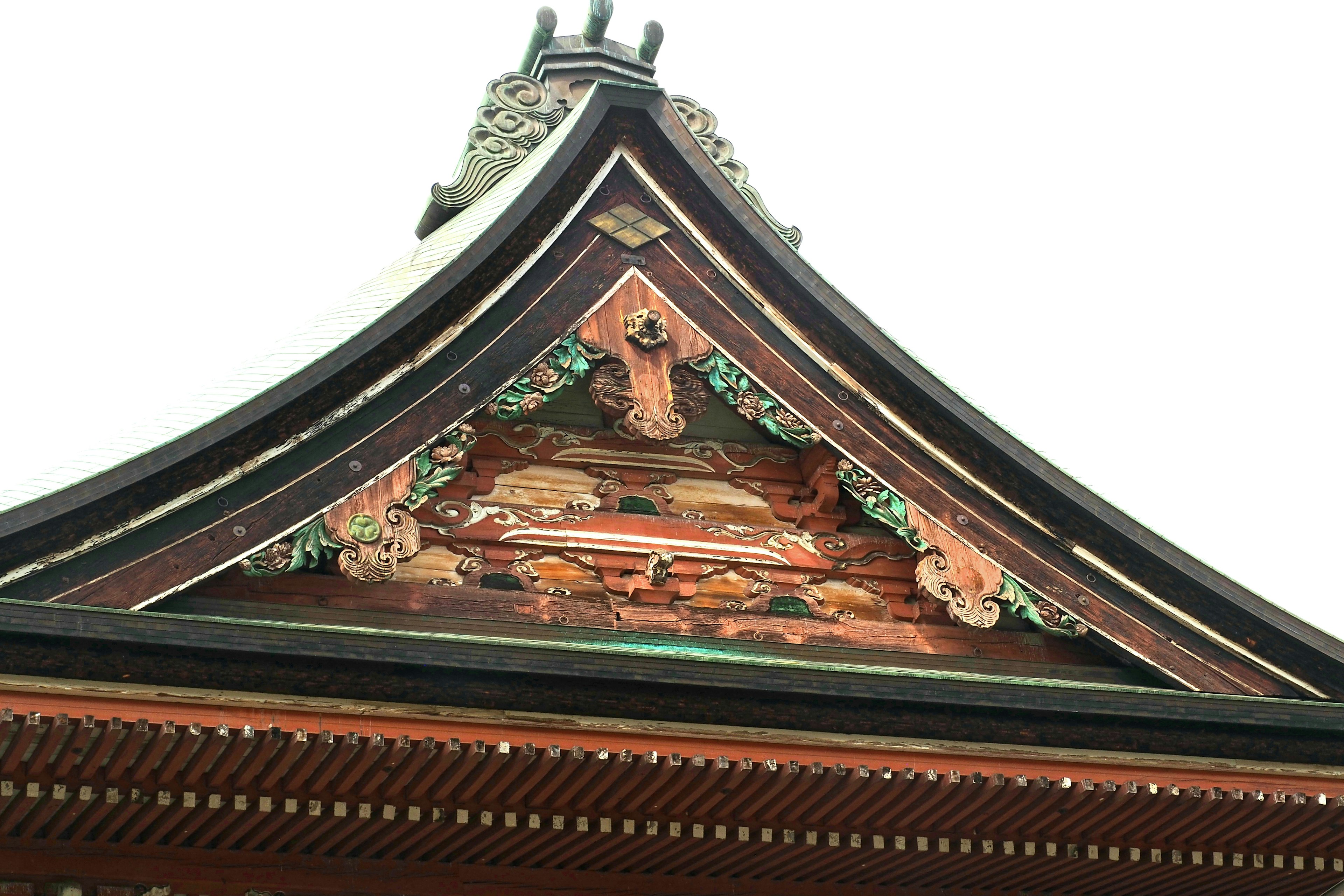 Detailed wooden roof decoration of a traditional Japanese temple