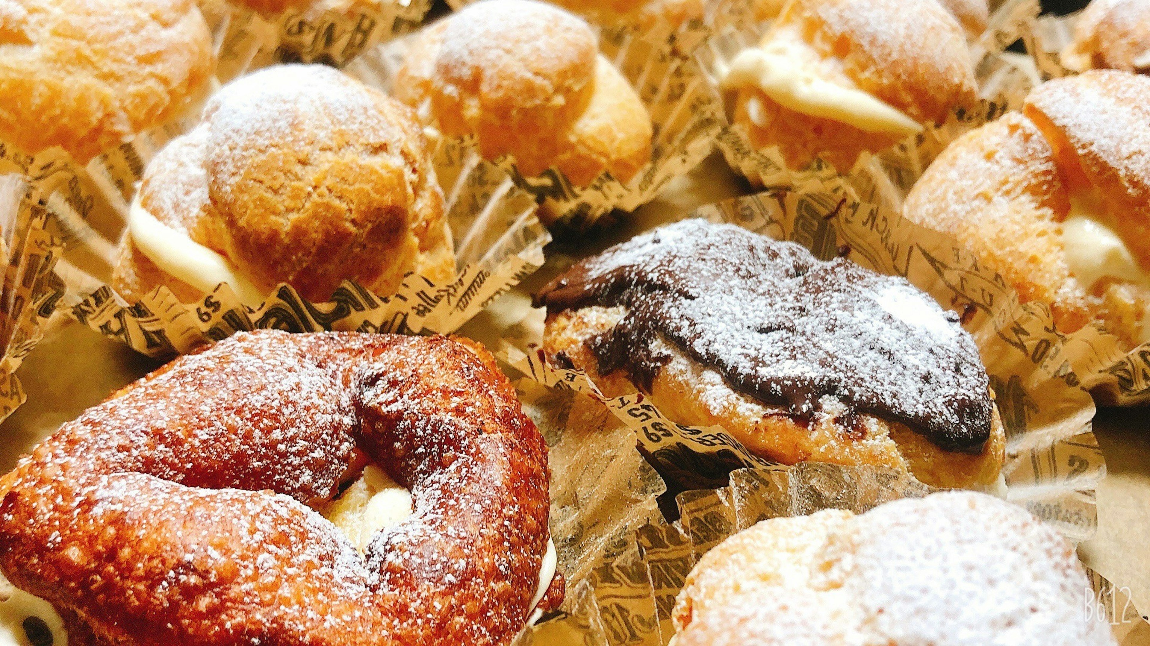 An assortment of delicious pastries featuring various shapes and colors