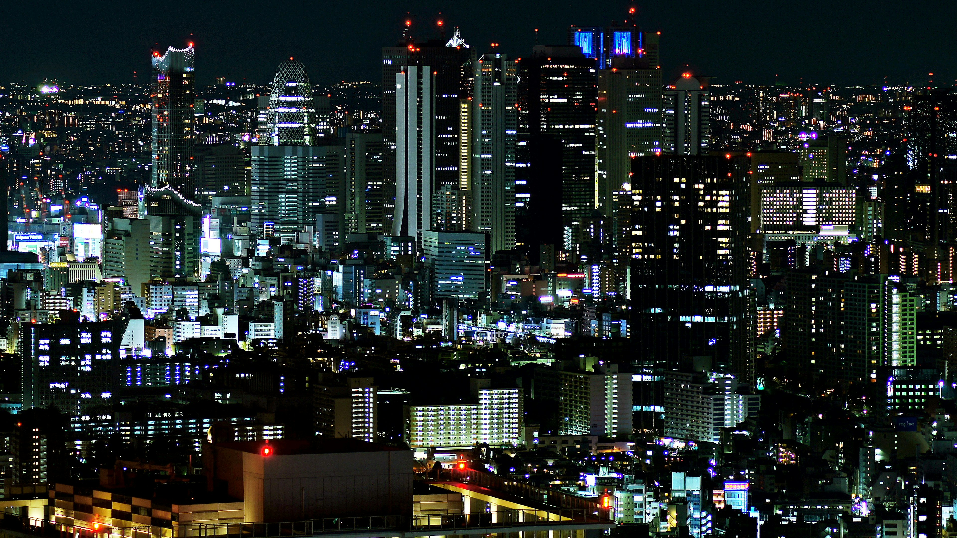 Tokyo skyline at night with illuminated skyscrapers