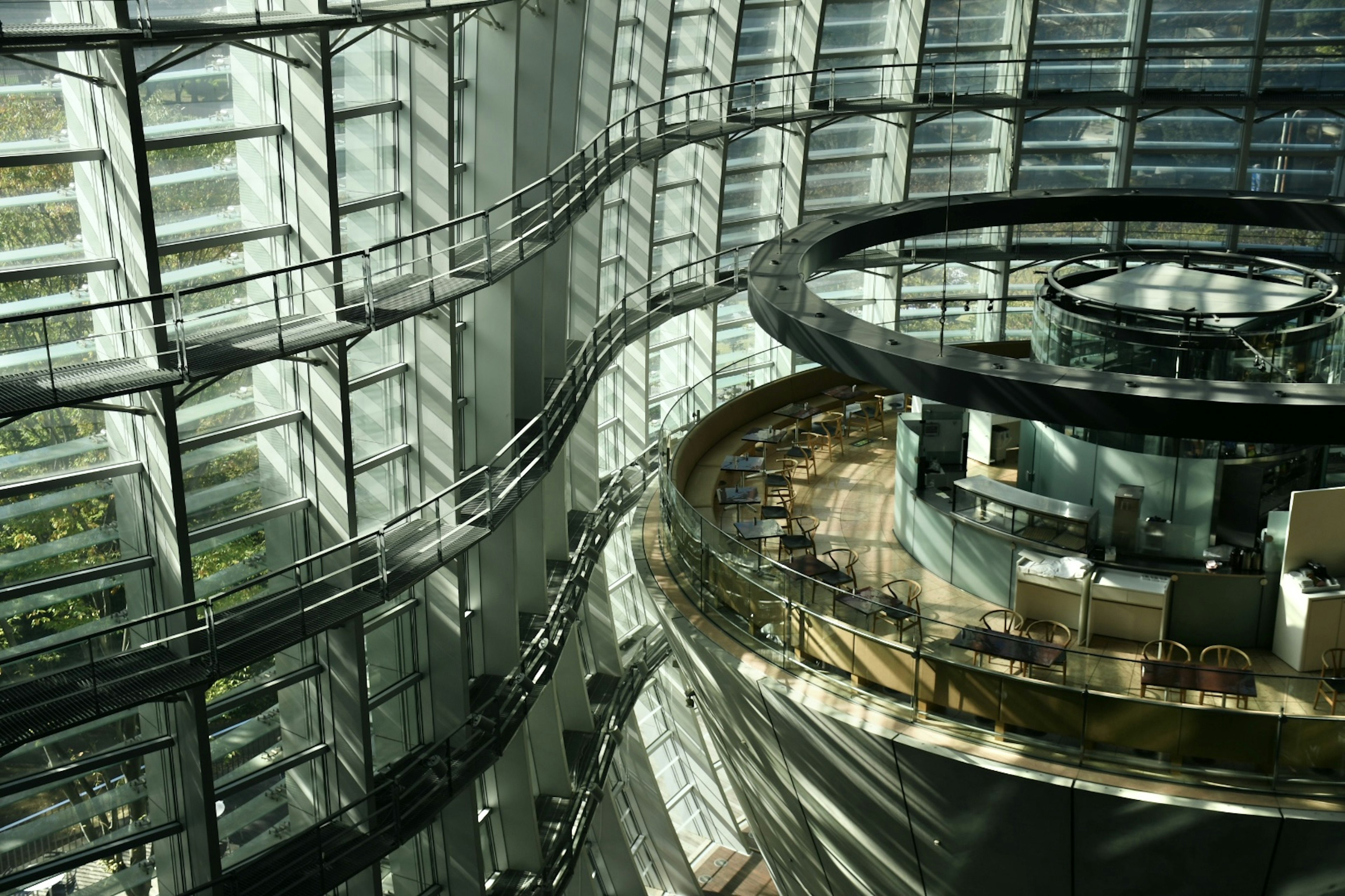 Interior of a modern building with glass walls and circular design