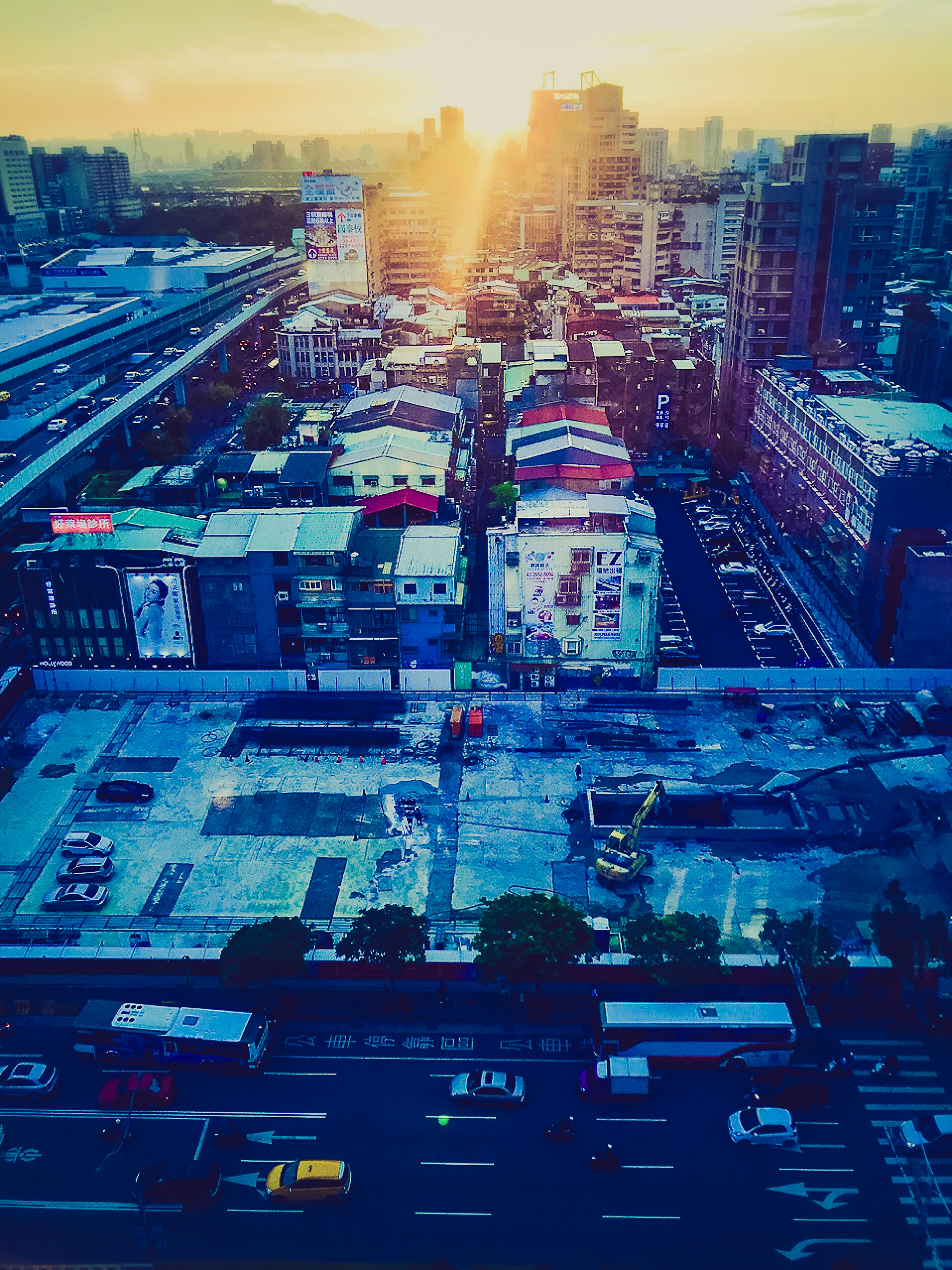 Urban landscape with sunset and buildings