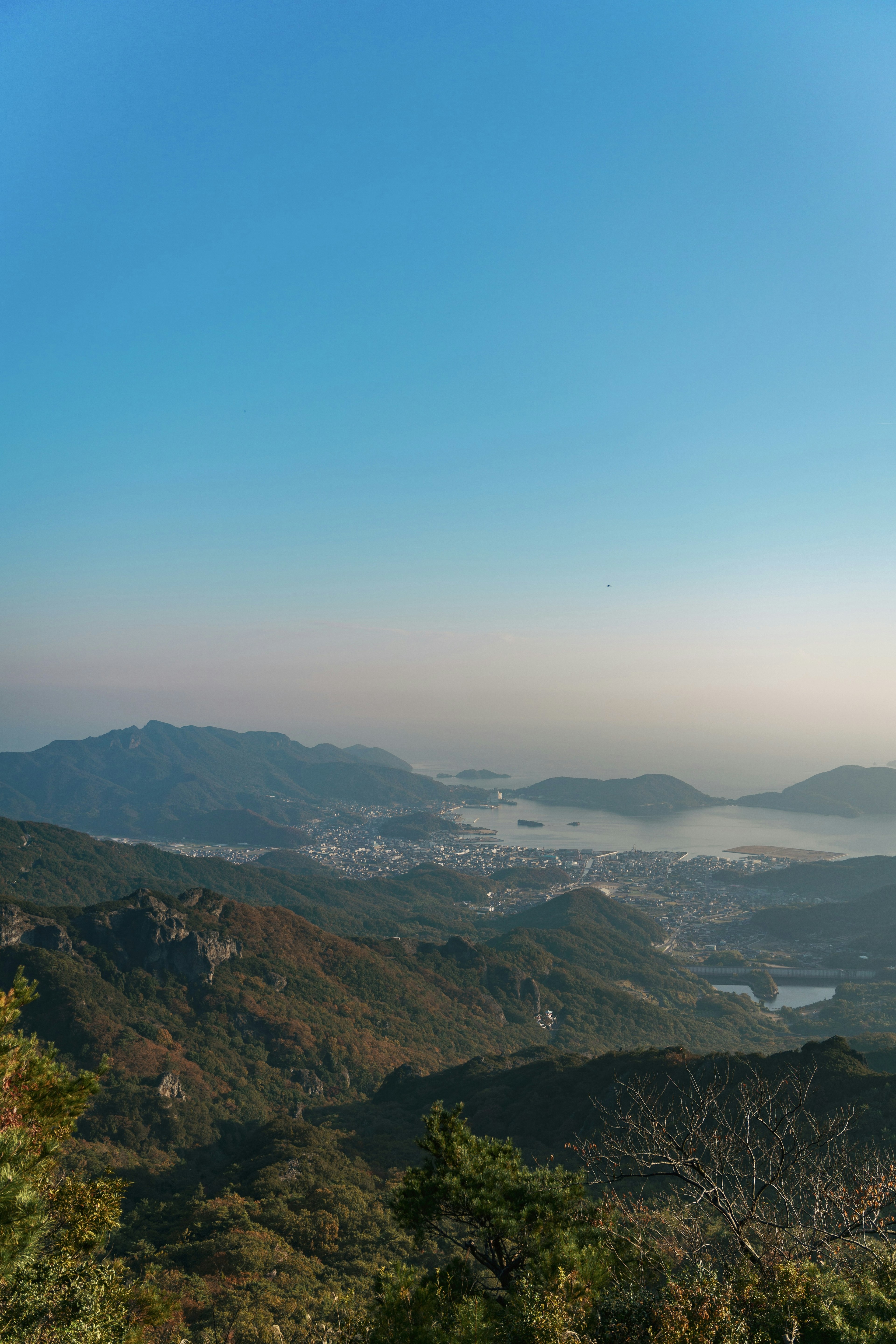 Scenic view of mountains and blue sky