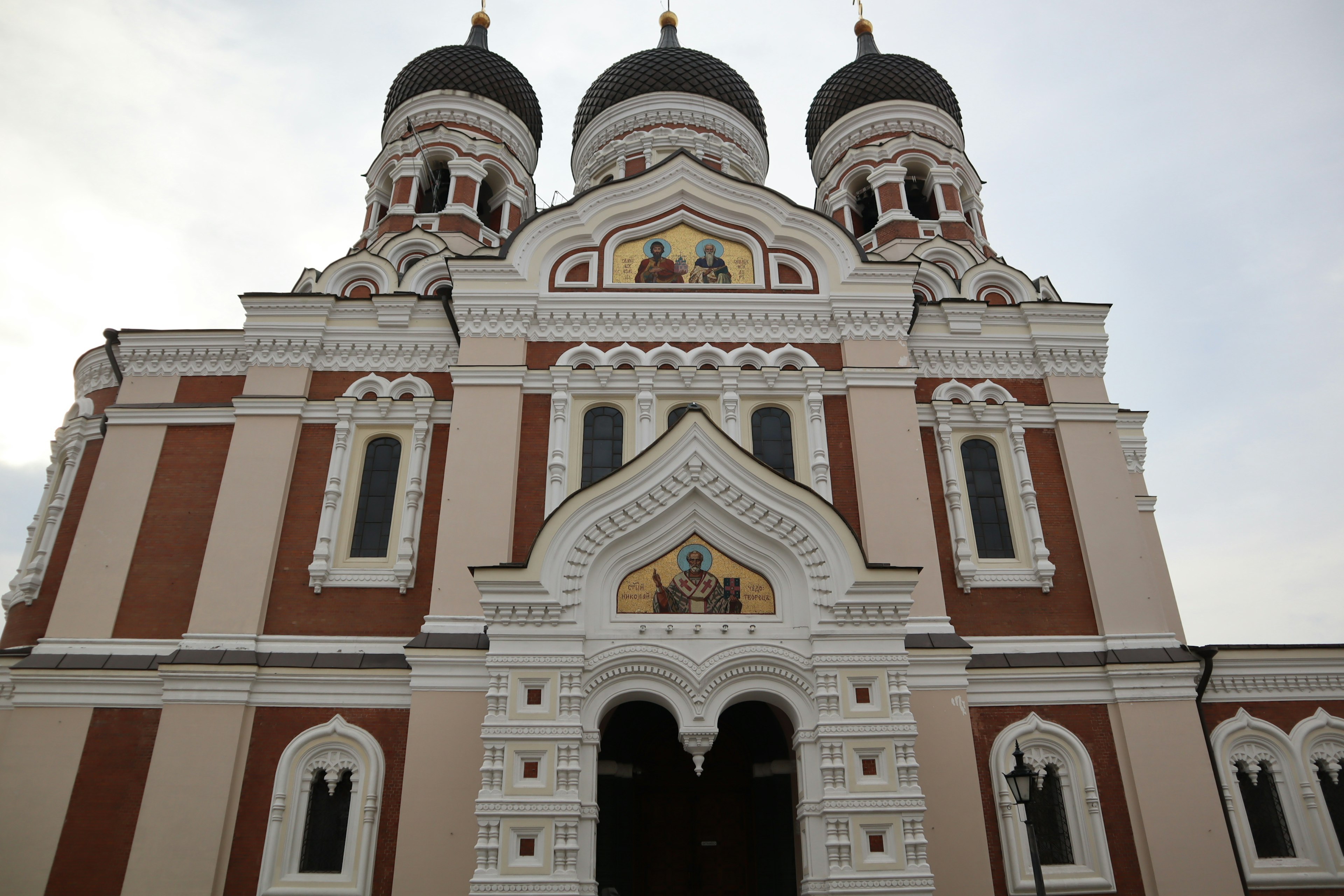 Facade of the Alexander Nevsky Cathedral with distinctive domes and ornate details