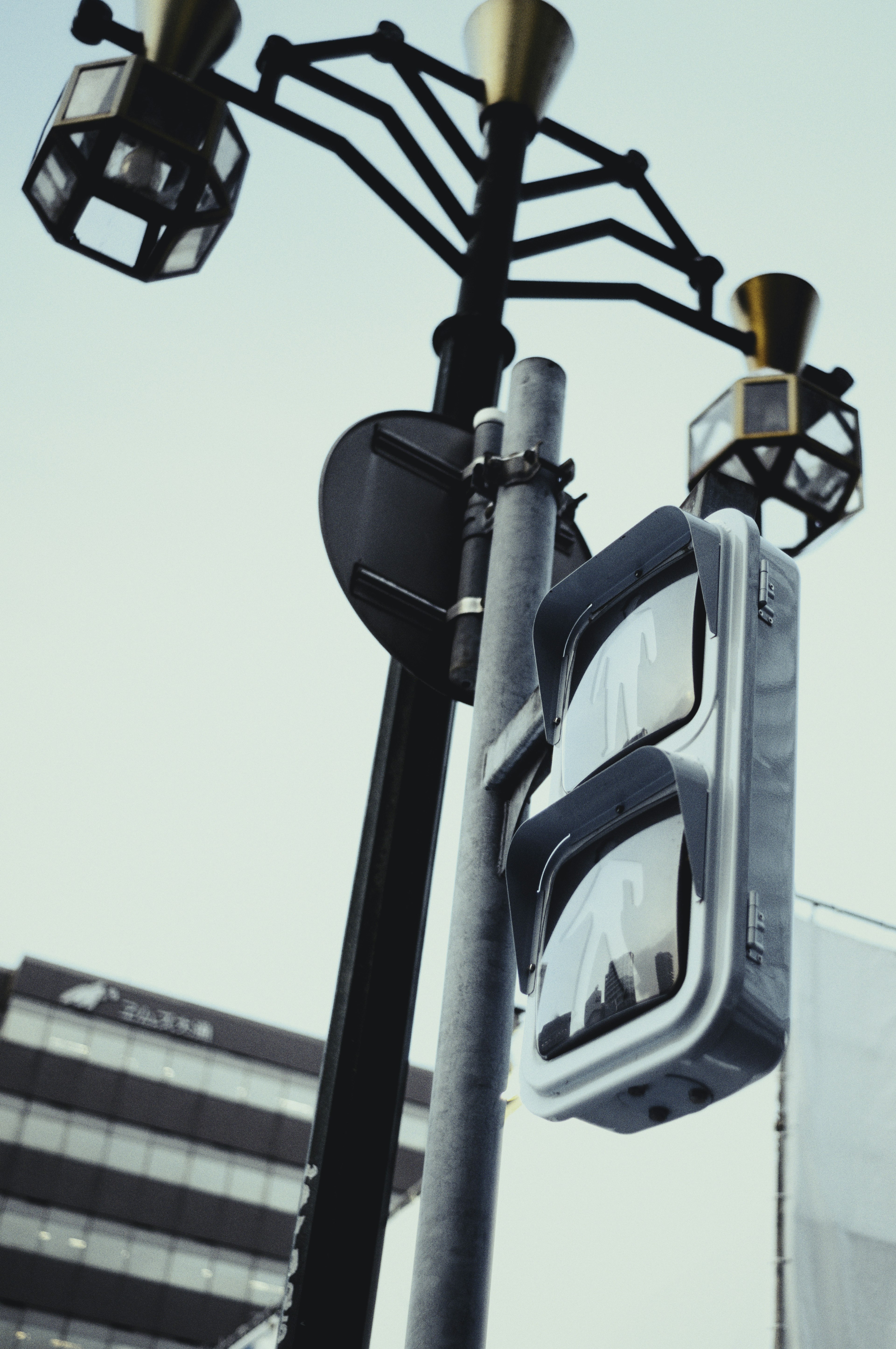 Urban landscape featuring streetlights and traffic signals