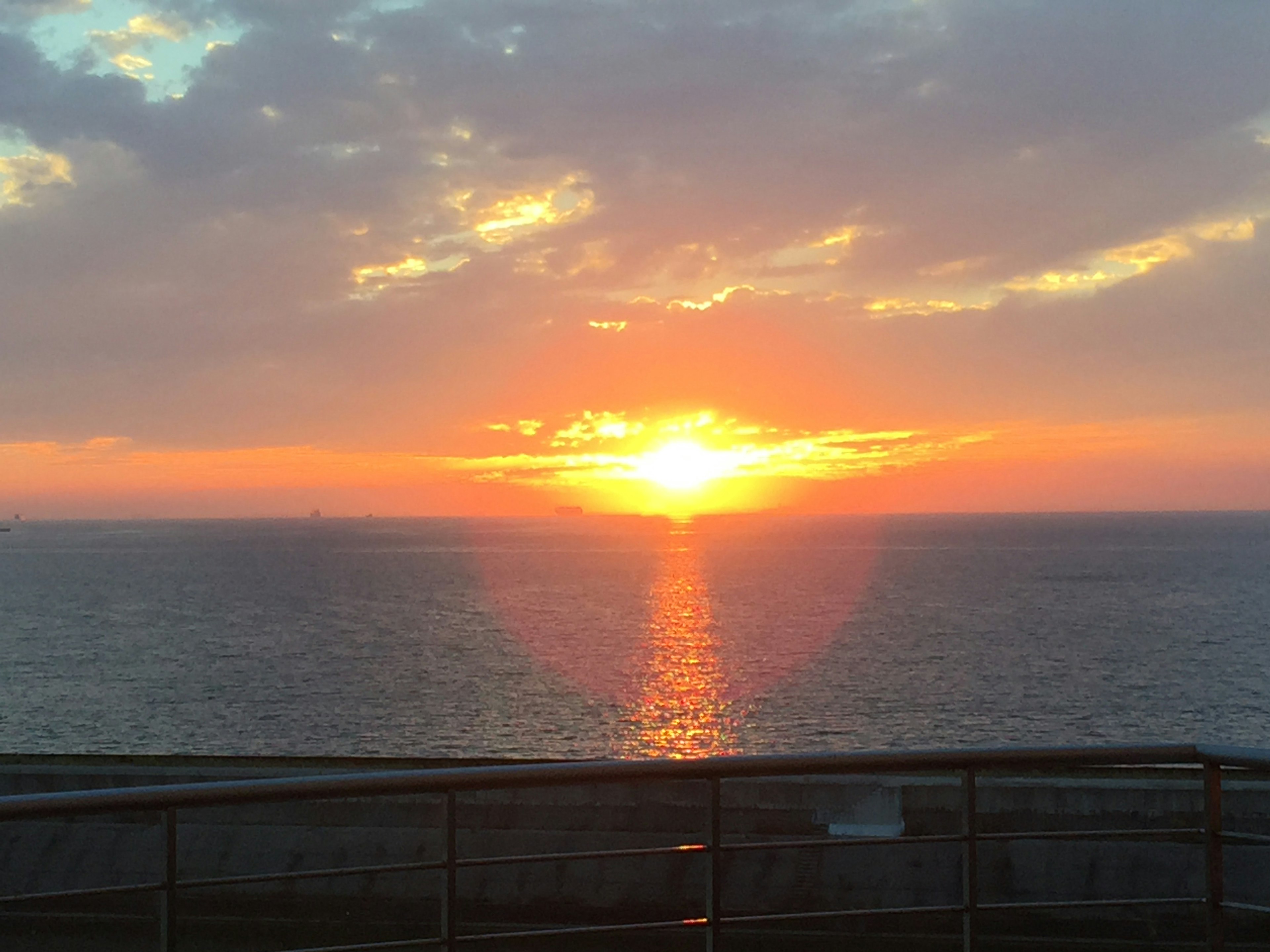 Beautiful sunset over the ocean with clouds