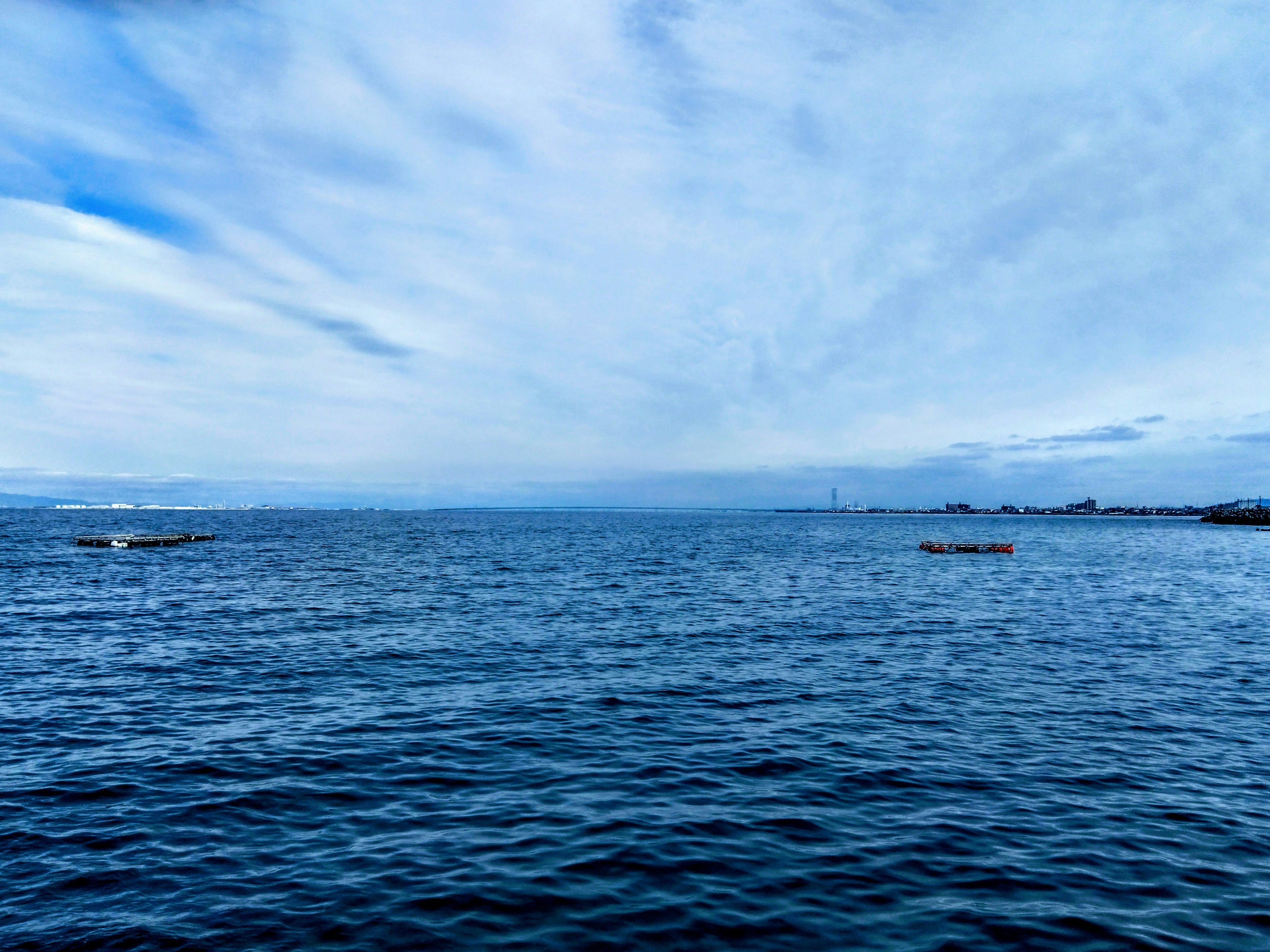 Expansive view of blue ocean and sky