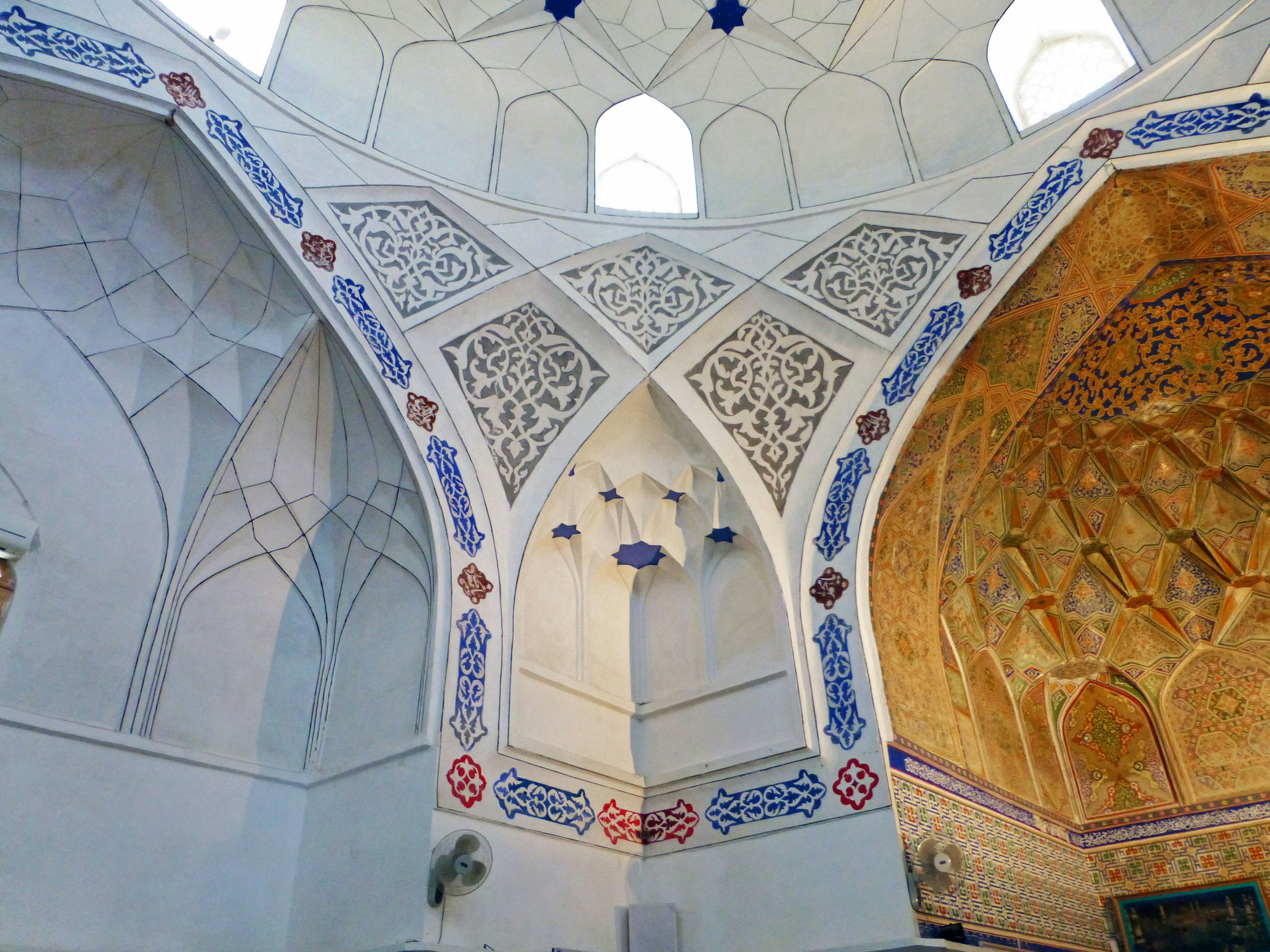 Intricate arches and decorative ceiling details in an indoor space