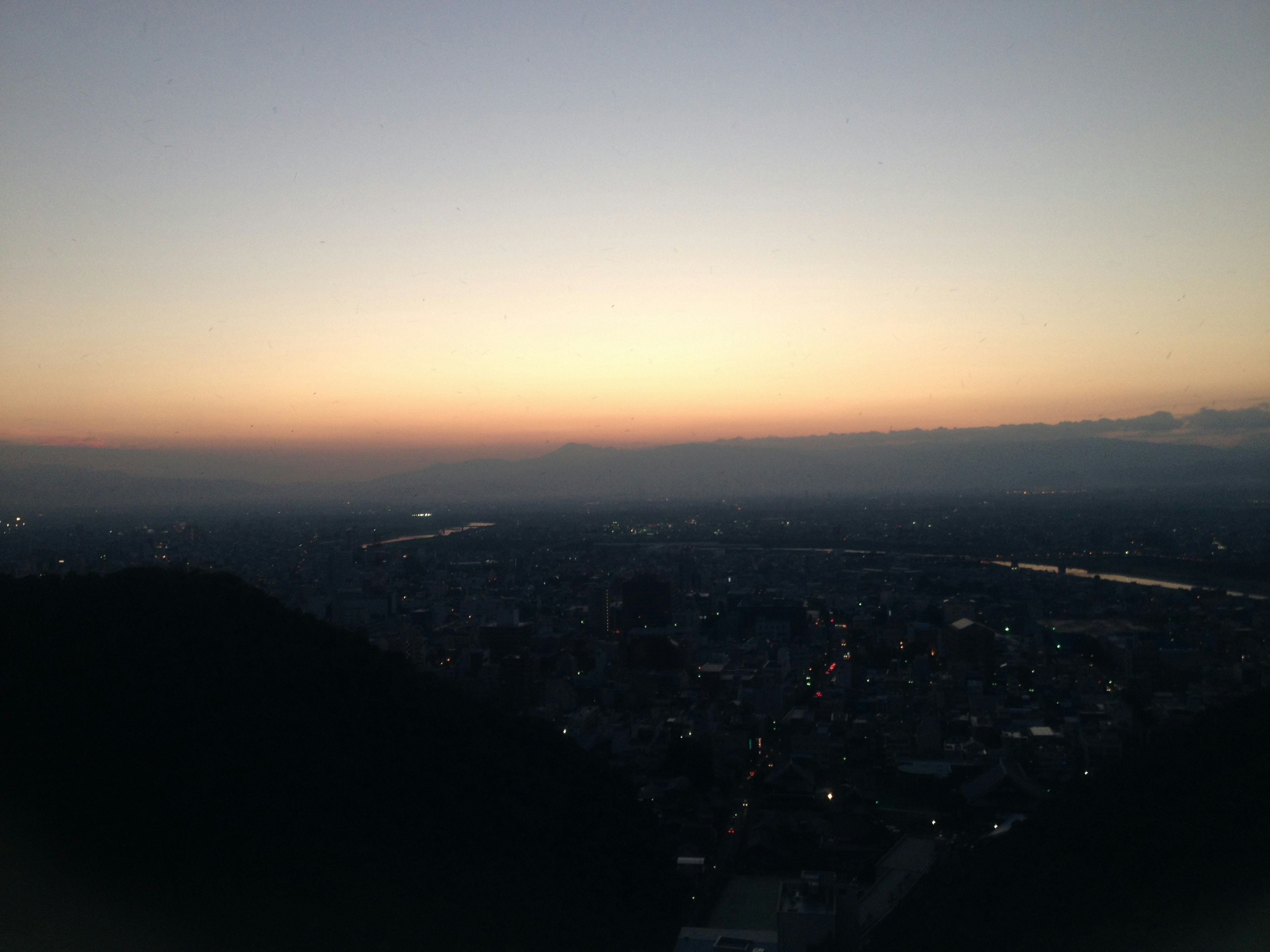 Beautiful city skyline at dusk with soft pastel colors