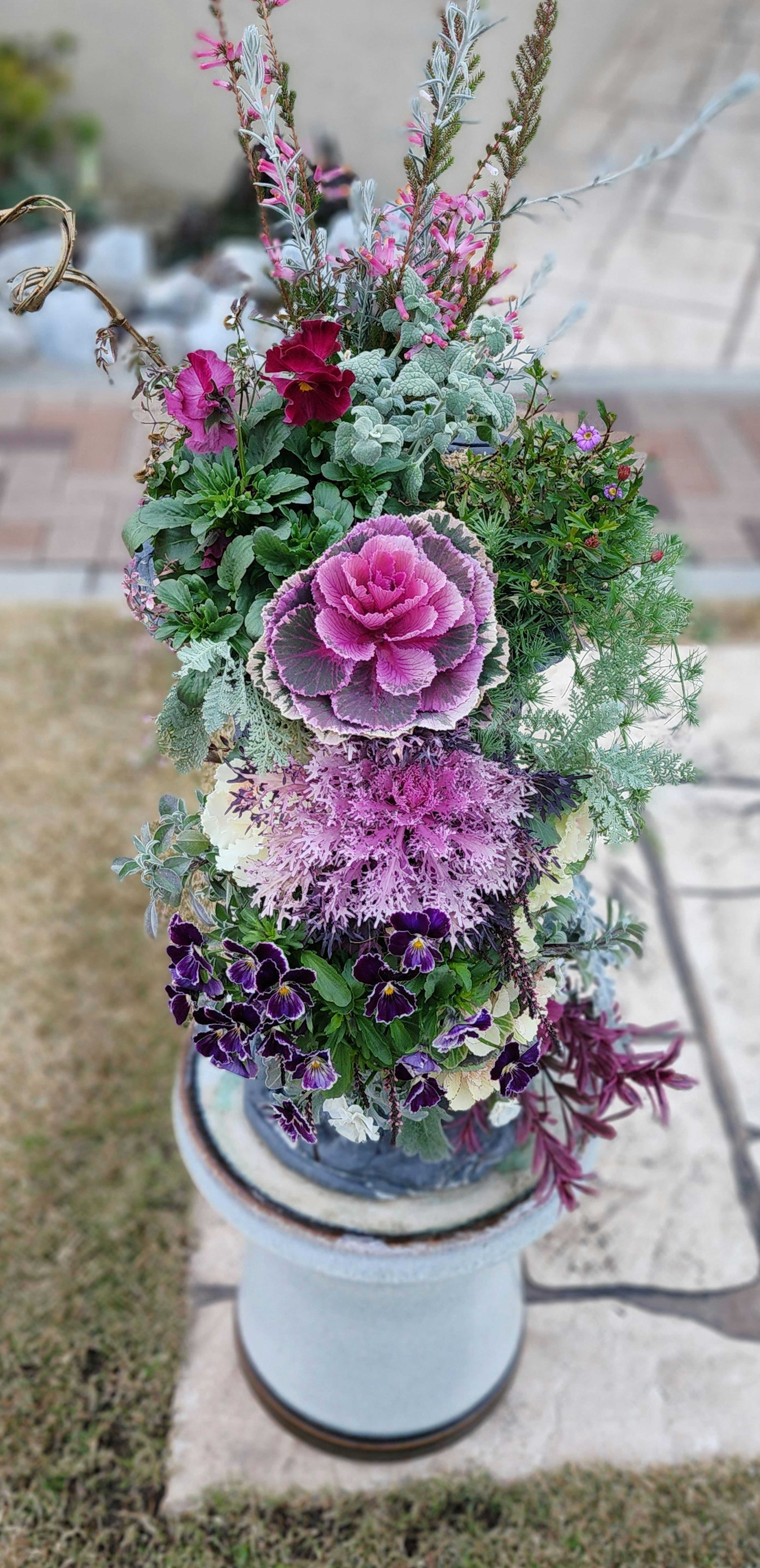 Beautiful floral arrangement featuring colorful flowers and leaves