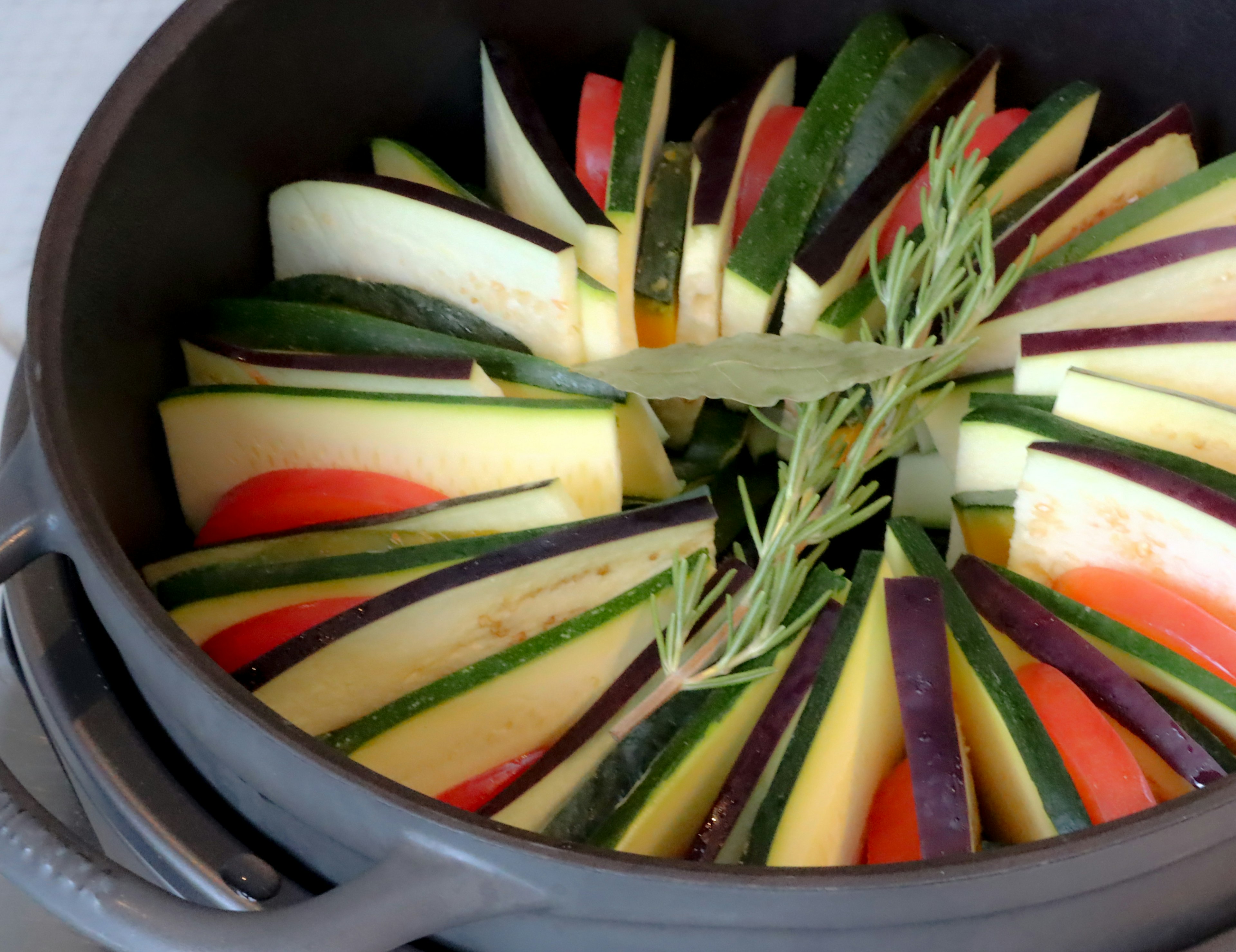 Colorful vegetables arranged beautifully in a pot